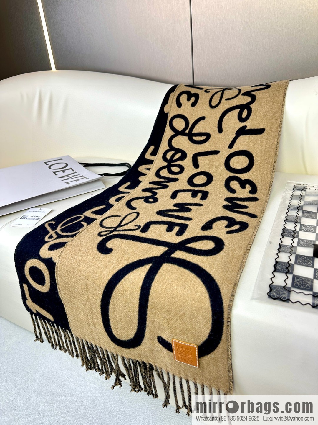 LOEWE decorated with Anagram pattern, graffiti scarf