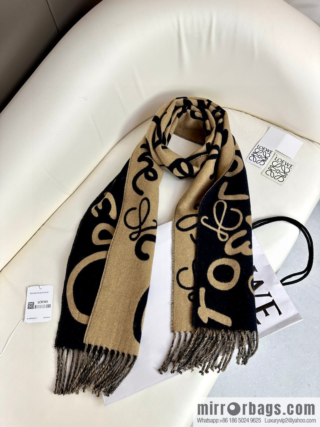 LOEWE decorated with Anagram pattern, graffiti scarf
