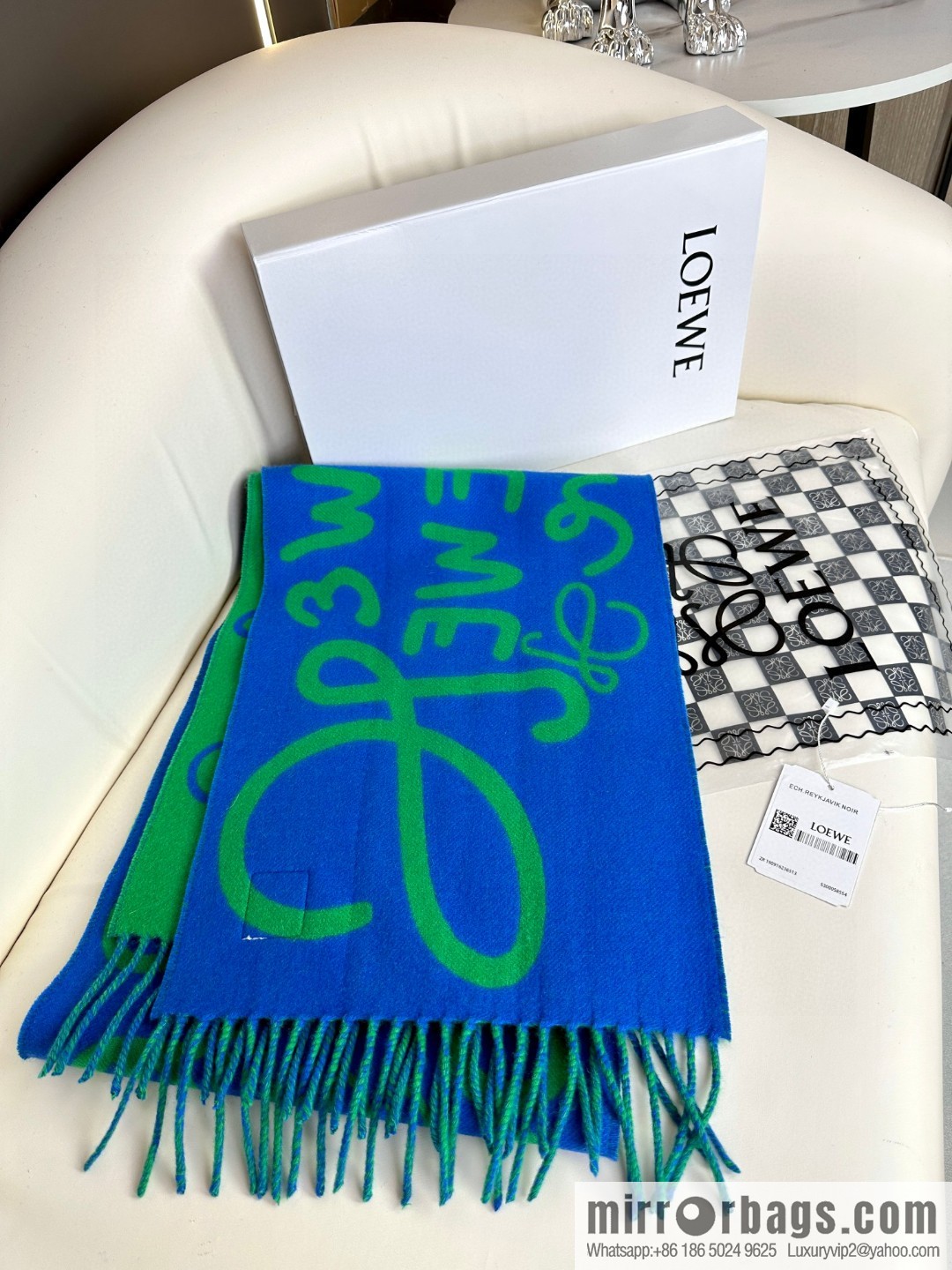 LOEWE decorated with Anagram pattern, graffiti scarf
