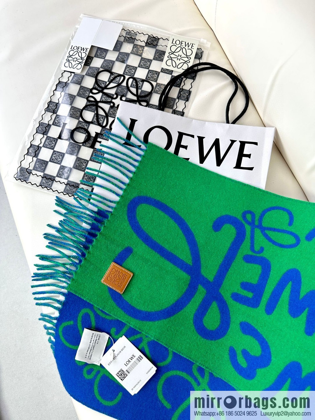LOEWE decorated with Anagram pattern, graffiti scarf