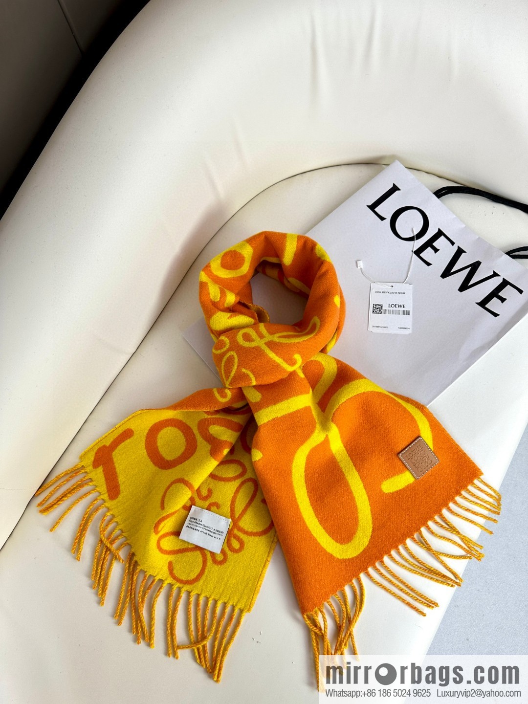 LOEWE decorated with Anagram pattern, graffiti scarf