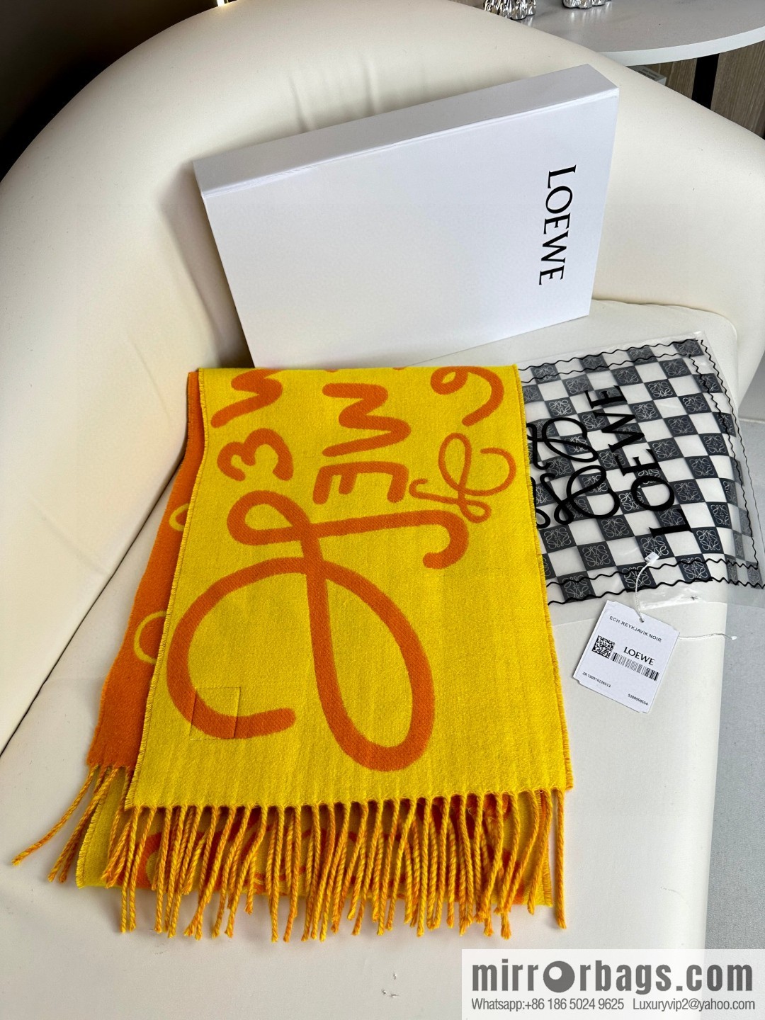 LOEWE decorated with Anagram pattern, graffiti scarf