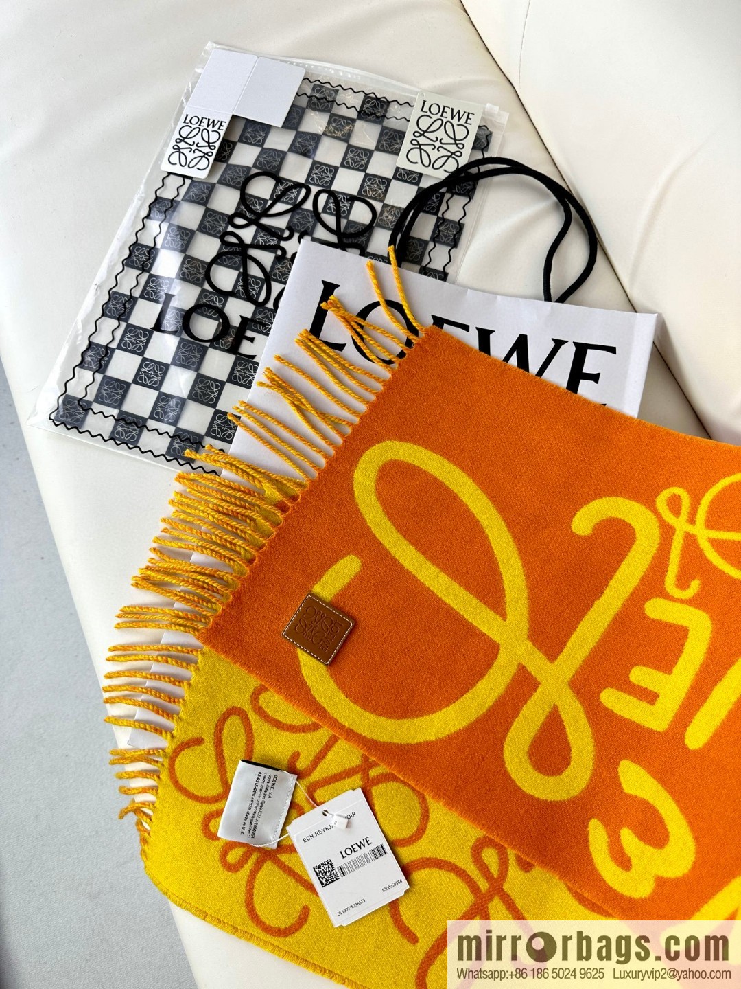 LOEWE decorated with Anagram pattern, graffiti scarf