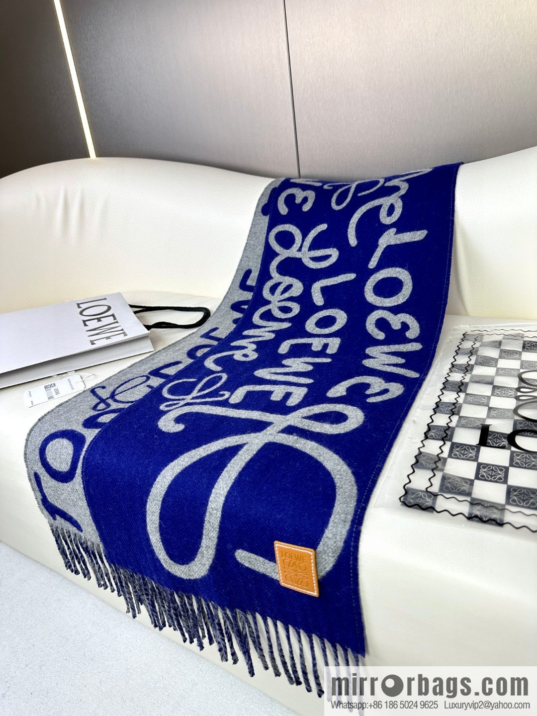 LOEWE decorated with Anagram pattern, graffiti scarf