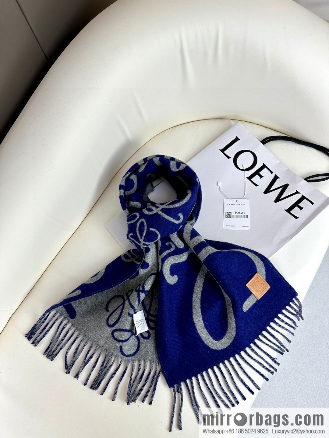 LOEWE decorated with Anagram pattern, graffiti scarf