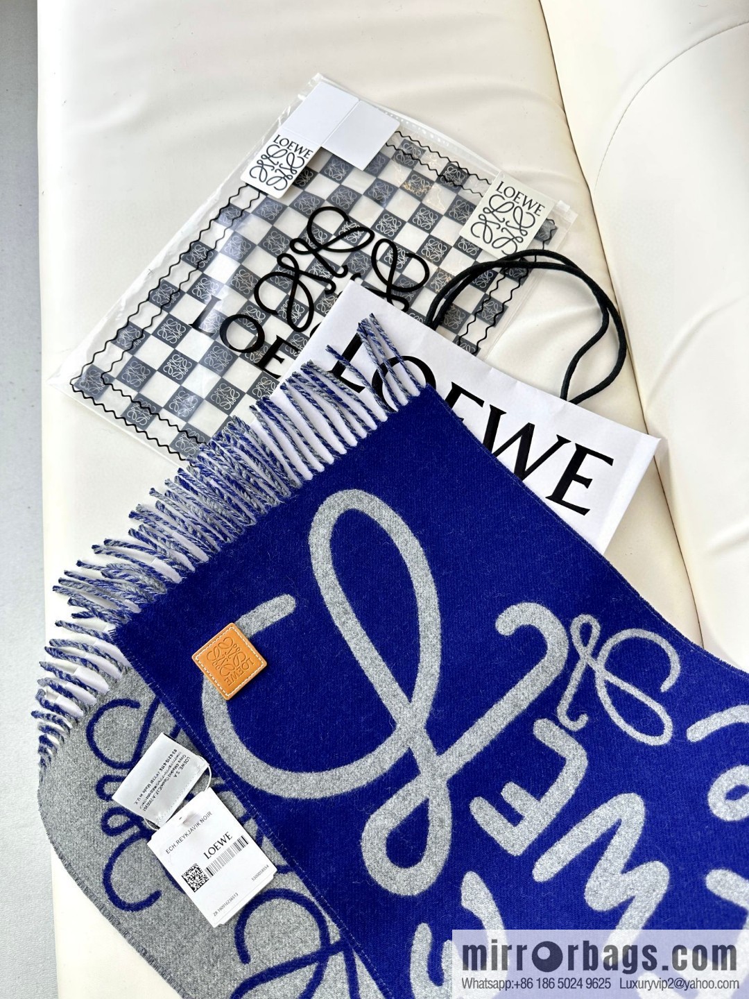 LOEWE decorated with Anagram pattern, graffiti scarf