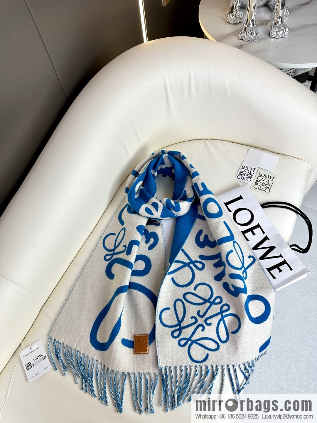 LOEWE decorated with Anagram pattern, graffiti scarf