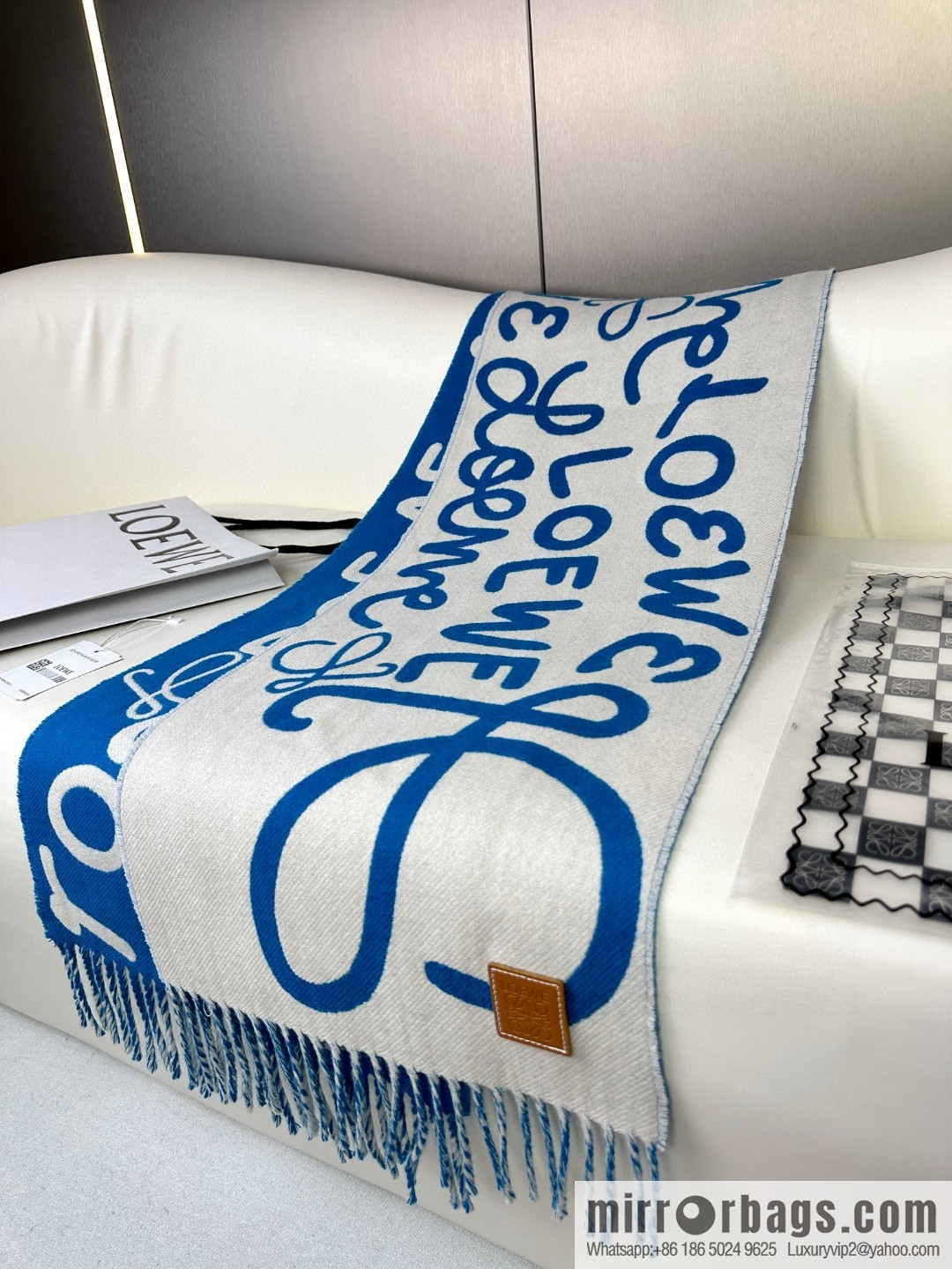 LOEWE decorated with Anagram pattern, graffiti scarf