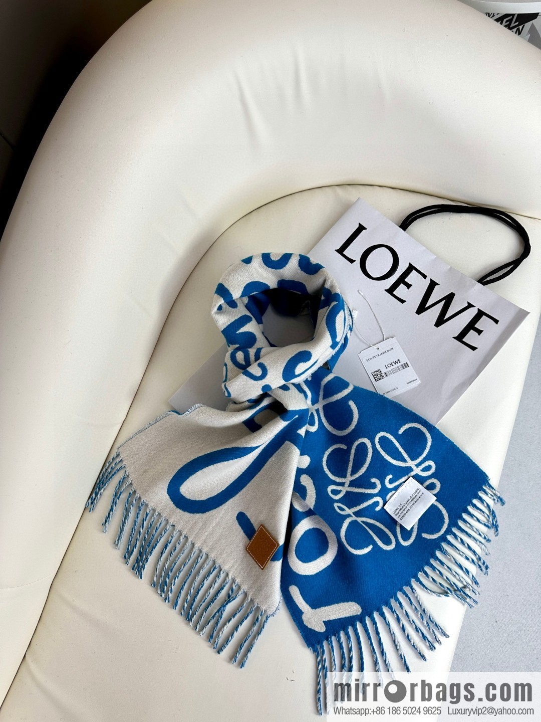 LOEWE decorated with Anagram pattern, graffiti scarf