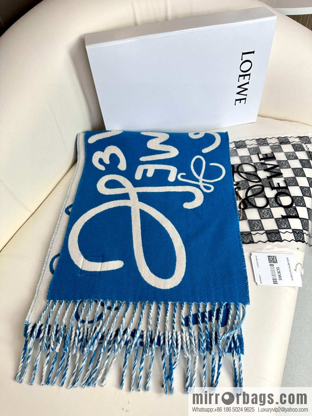 LOEWE decorated with Anagram pattern, graffiti scarf