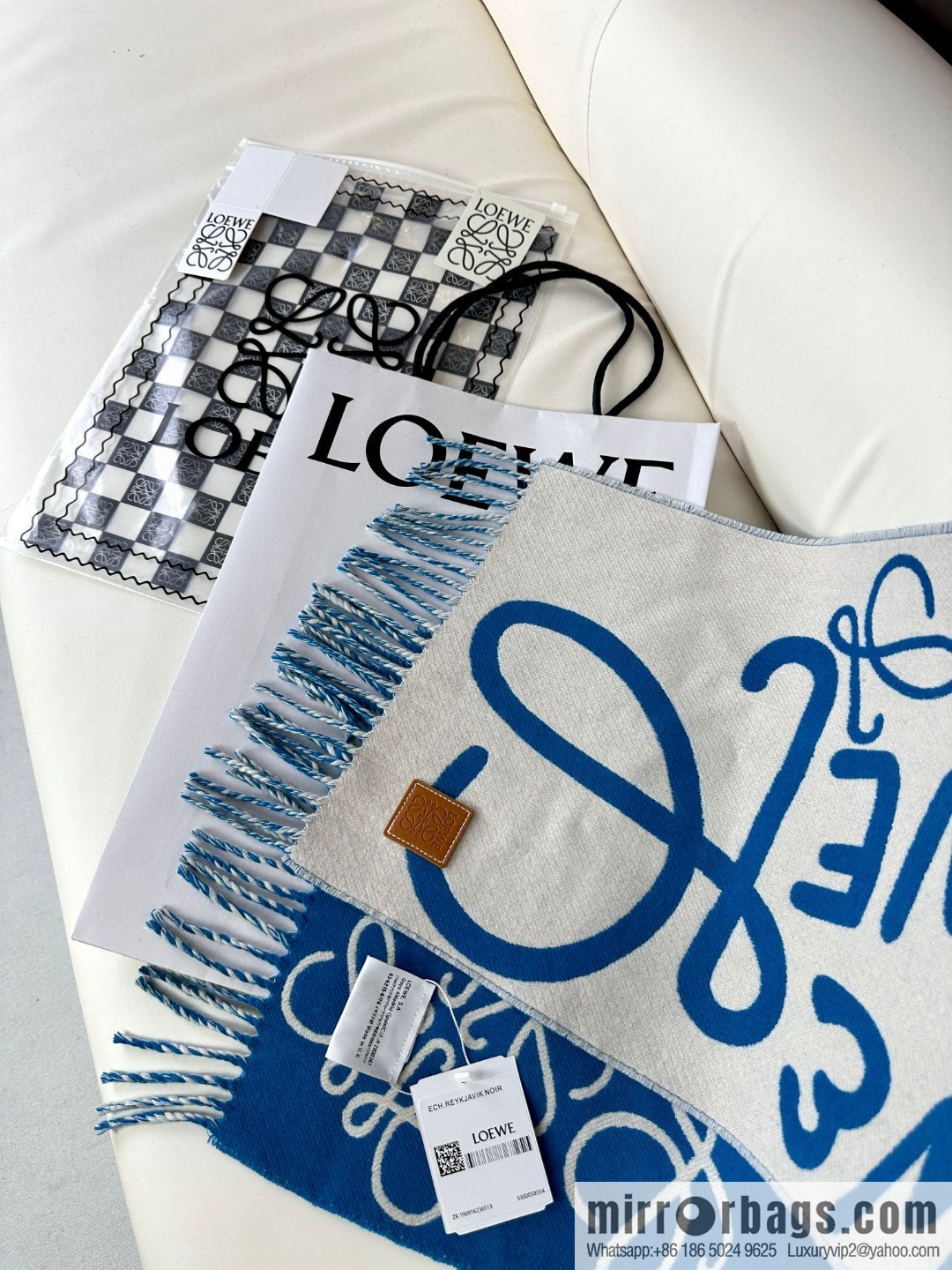 LOEWE decorated with Anagram pattern, graffiti scarf