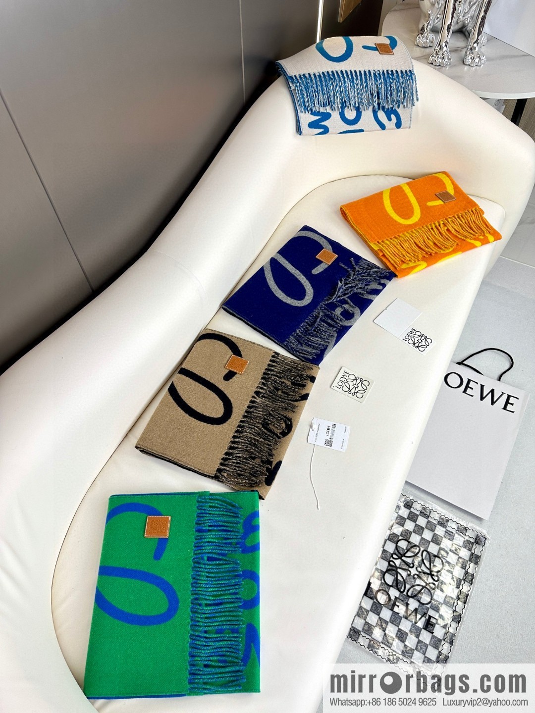 LOEWE decorated with Anagram pattern, graffiti scarf