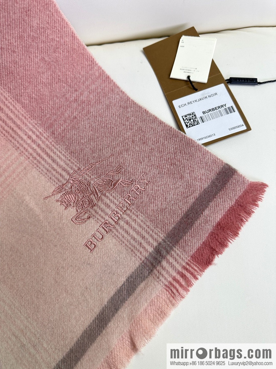 Burberry, counter-synced men's and women's cashmere scarves