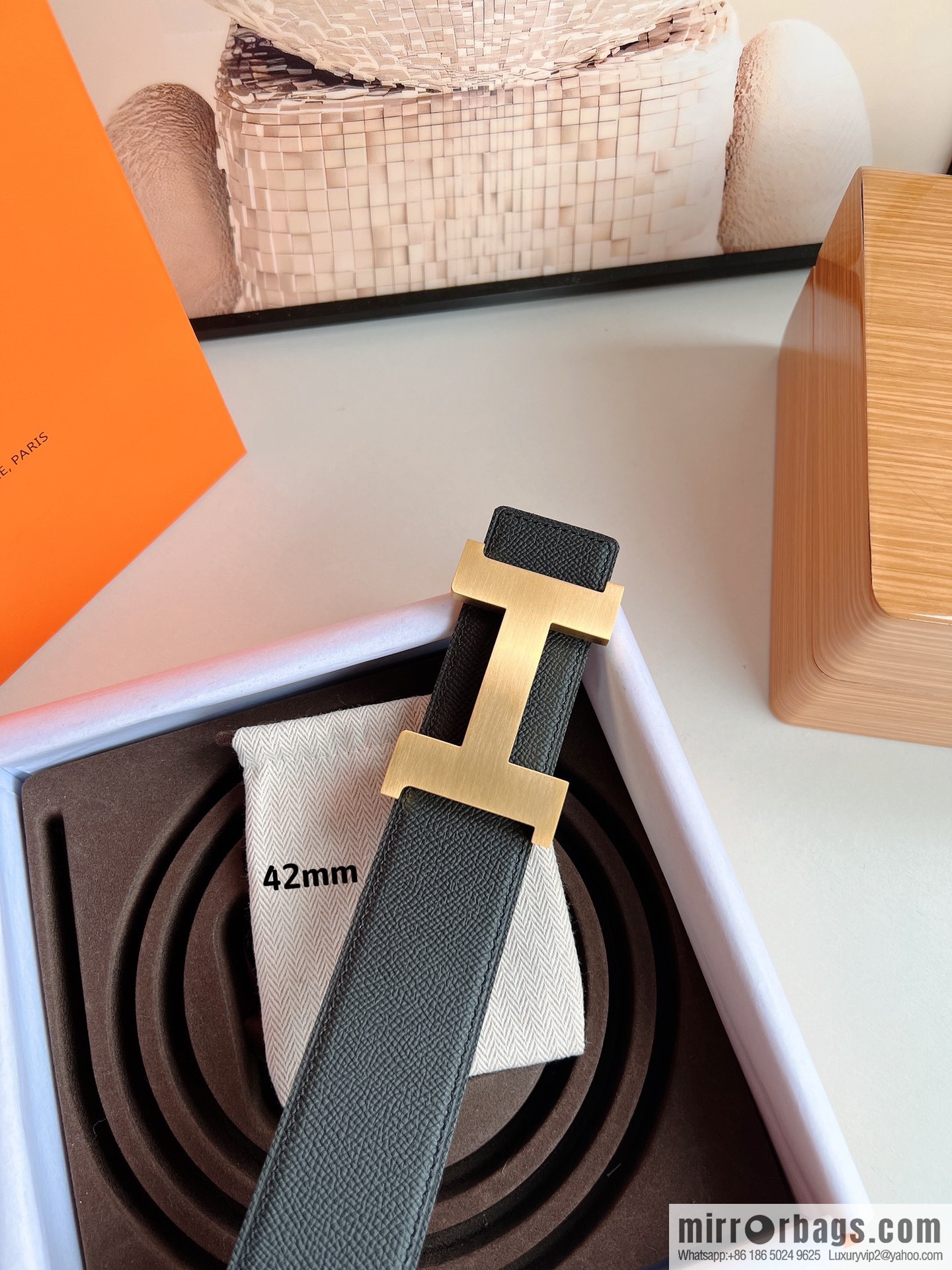 HERMES, Seiko crafted black cowhide belt with 42mm iconic elements
