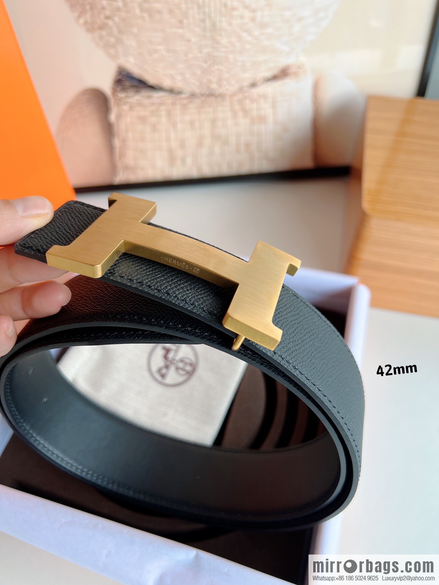 HERMES, Seiko crafted black cowhide belt with 42mm iconic elements