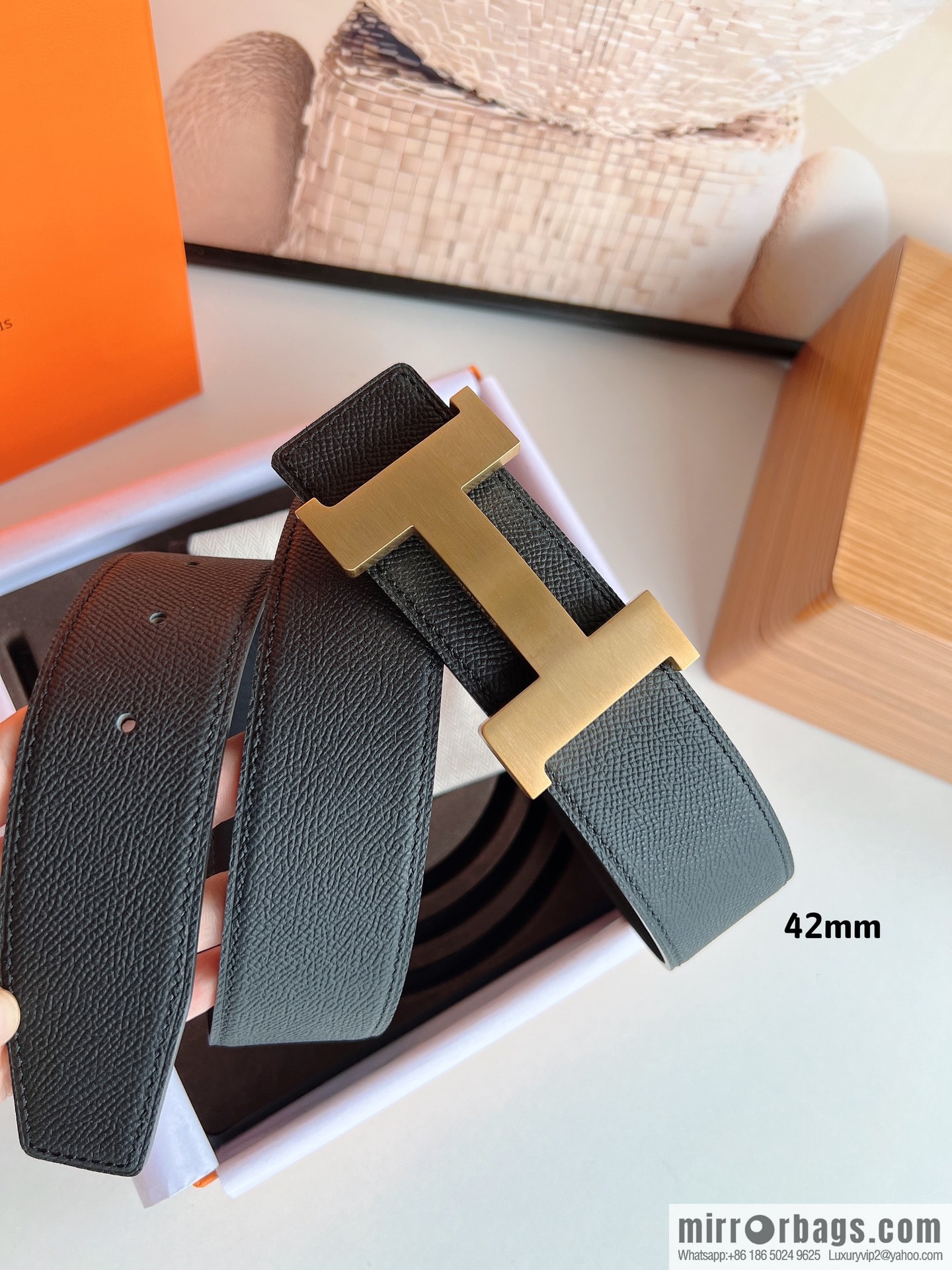 HERMES, Seiko crafted black cowhide belt with 42mm iconic elements