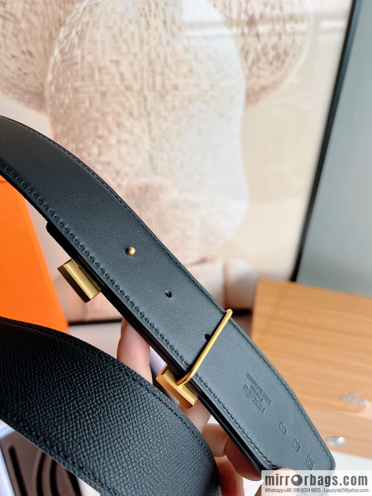 HERMES, Seiko crafted black cowhide belt with 42mm iconic elements
