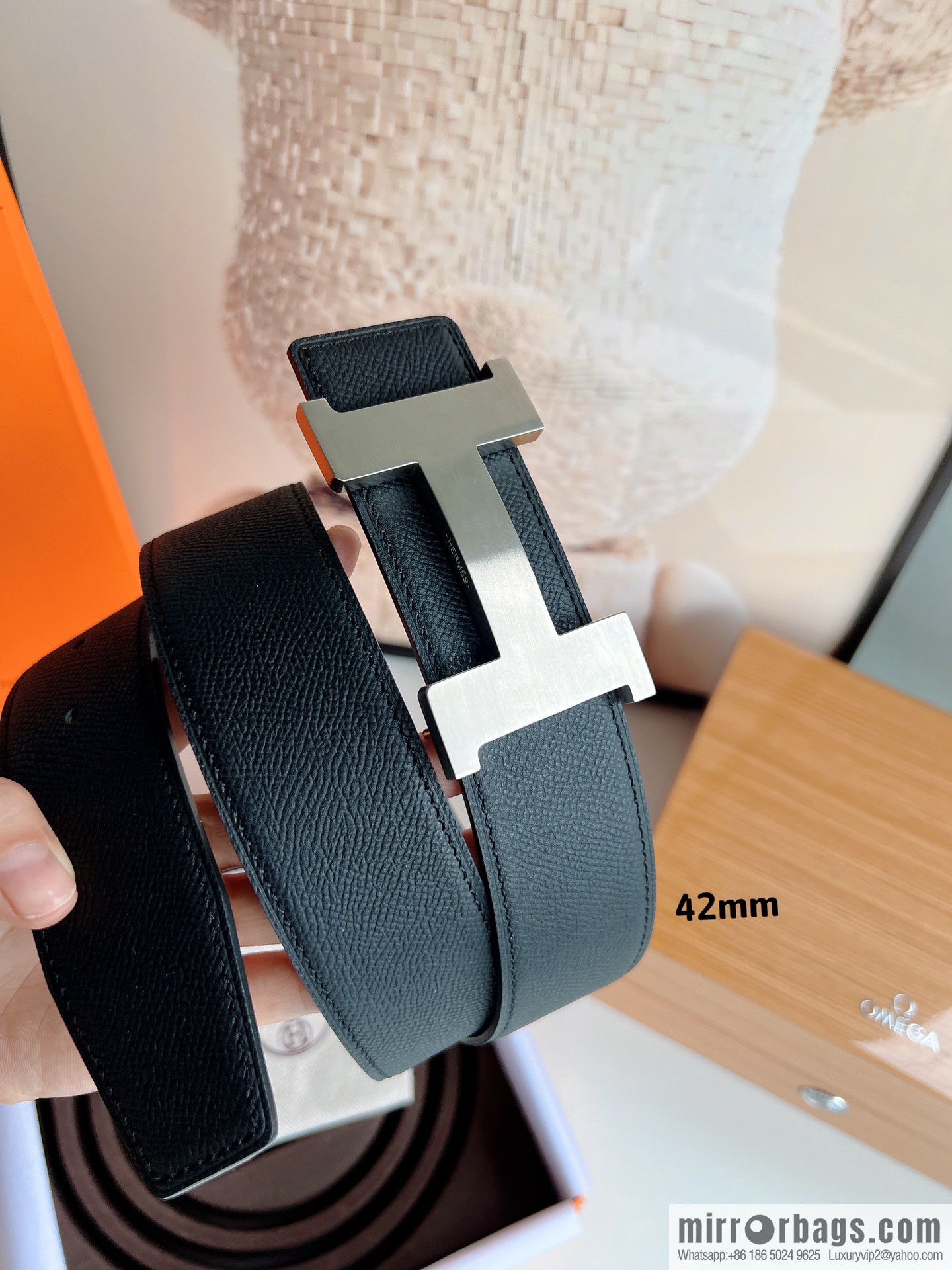 HERMES, Seiko crafted black cowhide belt with 42mm iconic elements