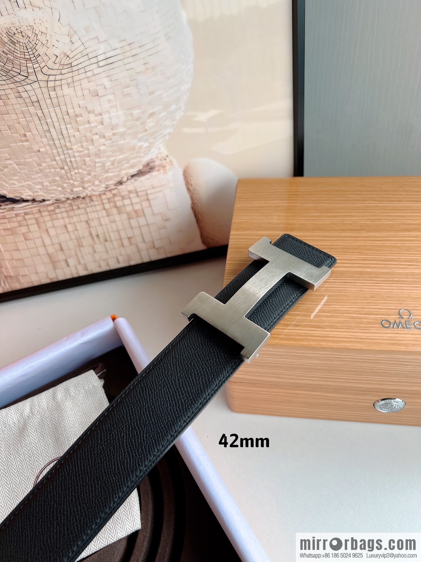 HERMES, Seiko crafted black cowhide belt with 42mm iconic elements
