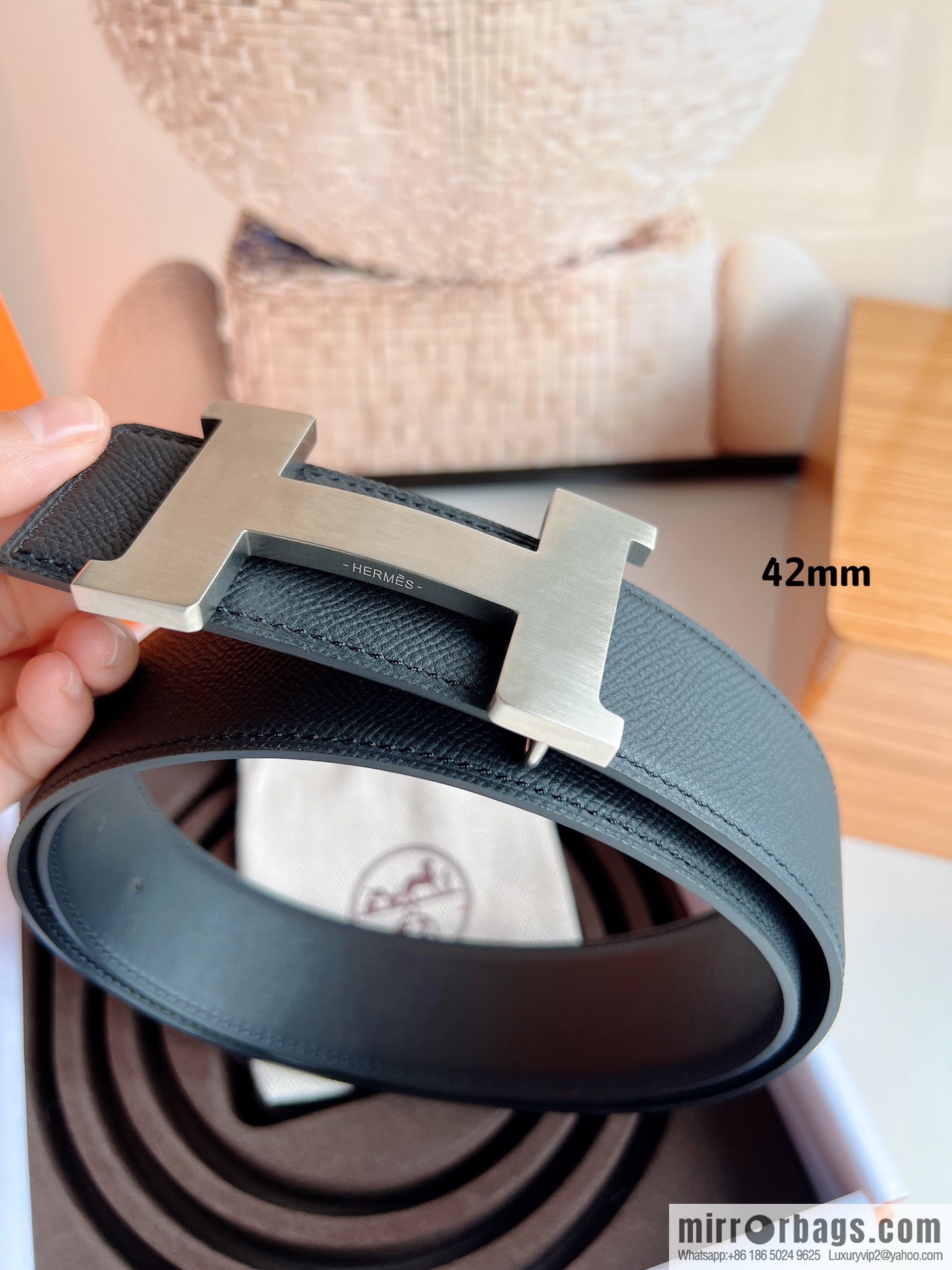 HERMES, Seiko crafted black cowhide belt with 42mm iconic elements