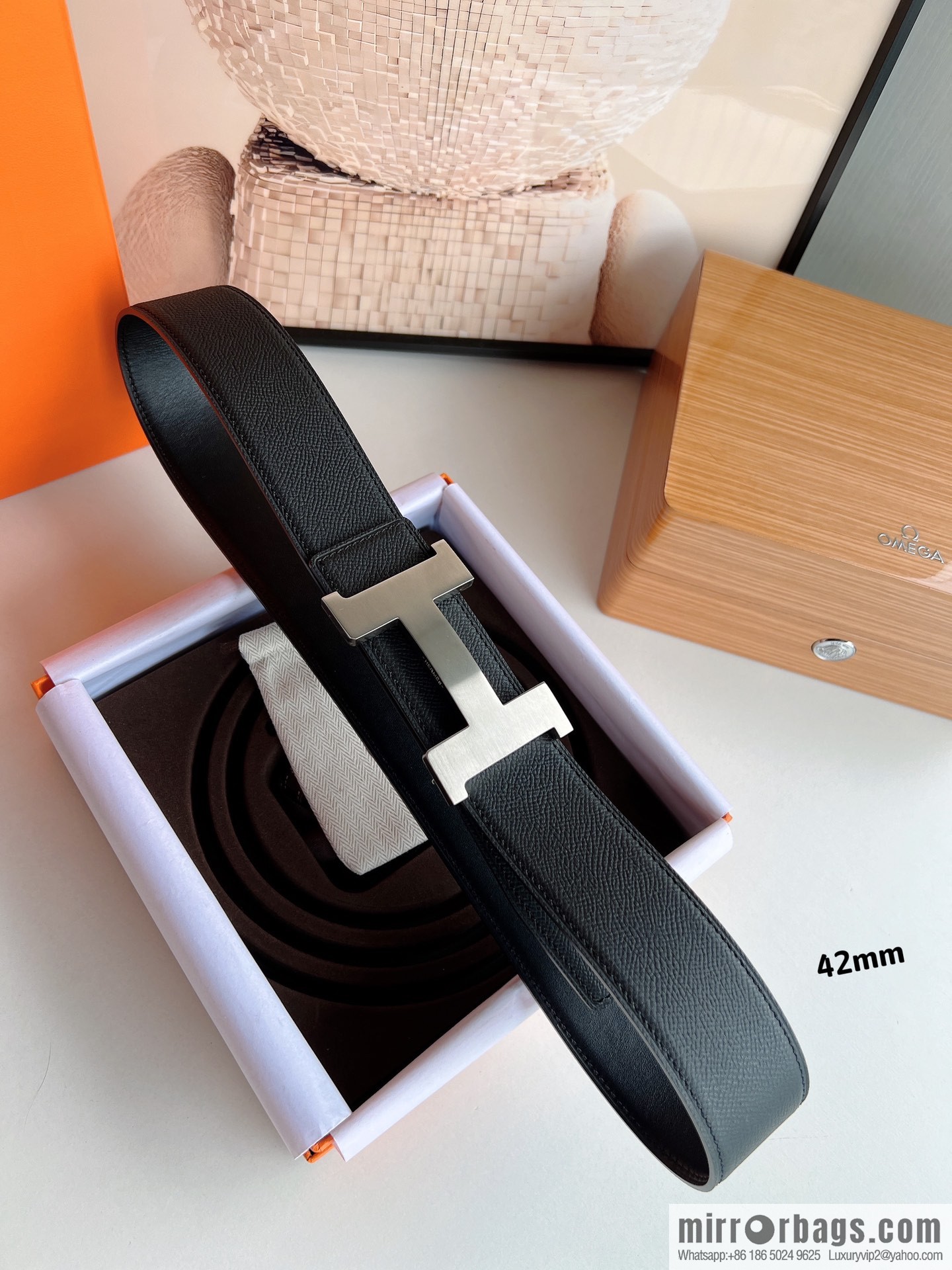 HERMES, Seiko crafted black cowhide belt with 42mm iconic elements