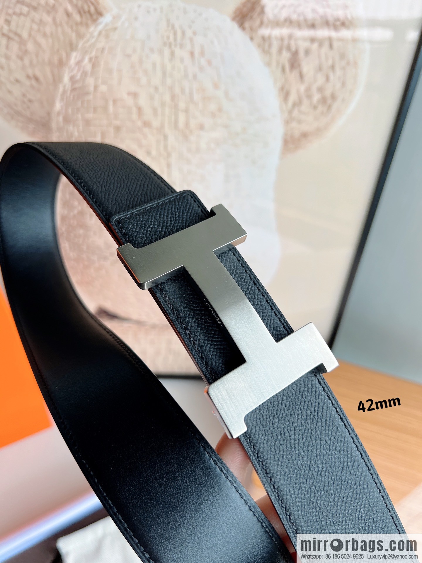 HERMES, Seiko crafted black cowhide belt with 42mm iconic elements
