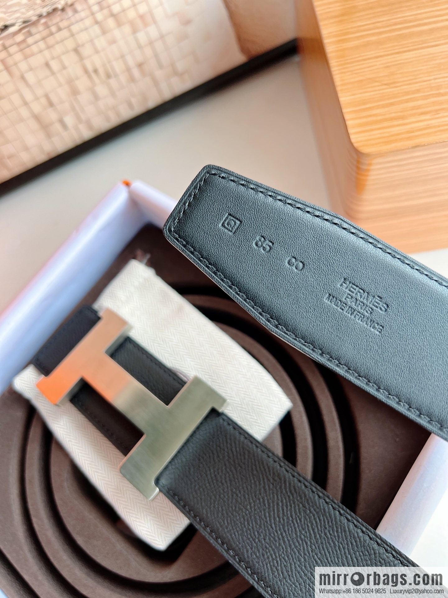 HERMES, Seiko crafted black cowhide belt with 42mm iconic elements