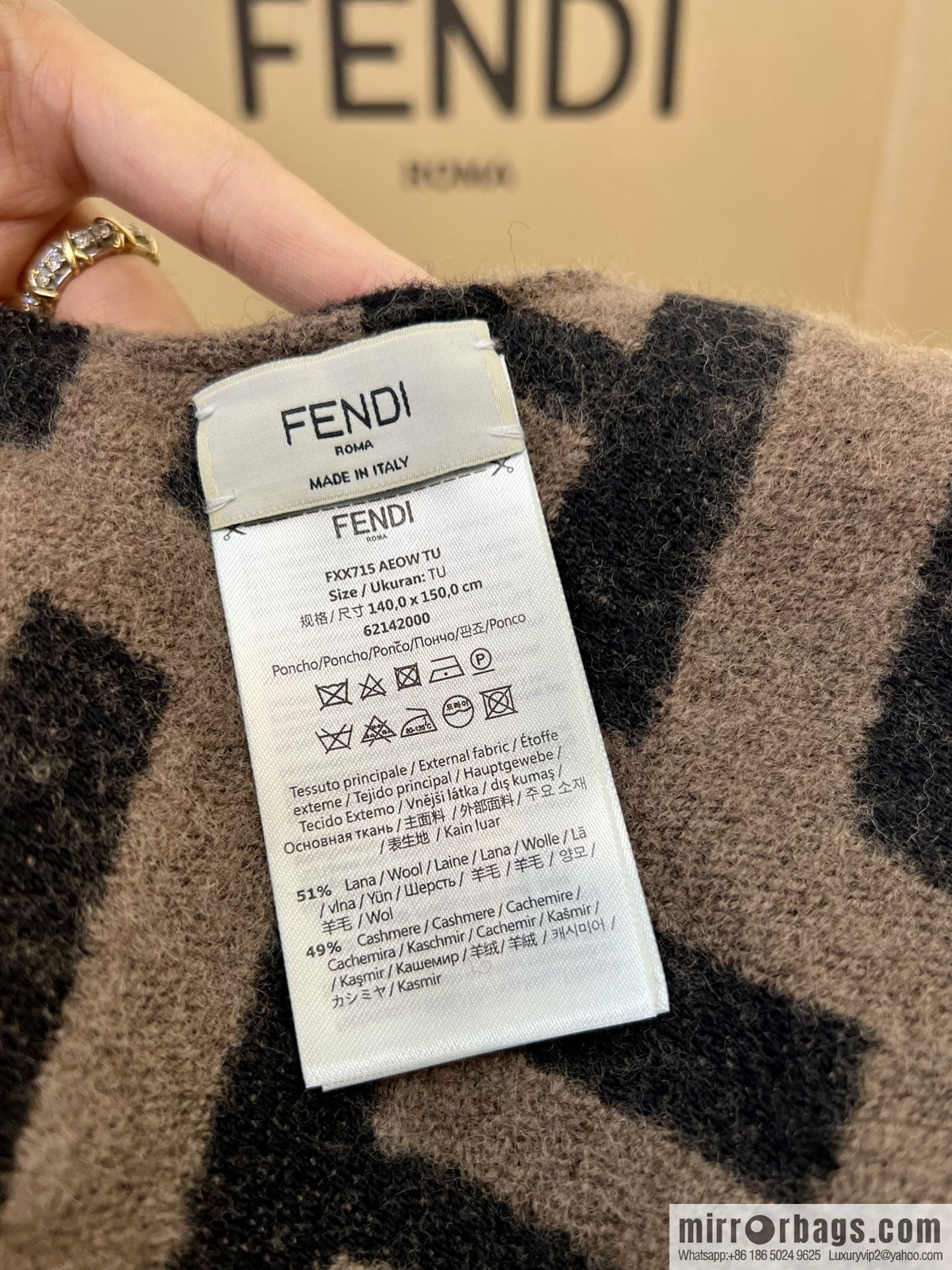 FENDI Fendi large FF pattern double-sided cape FXX715