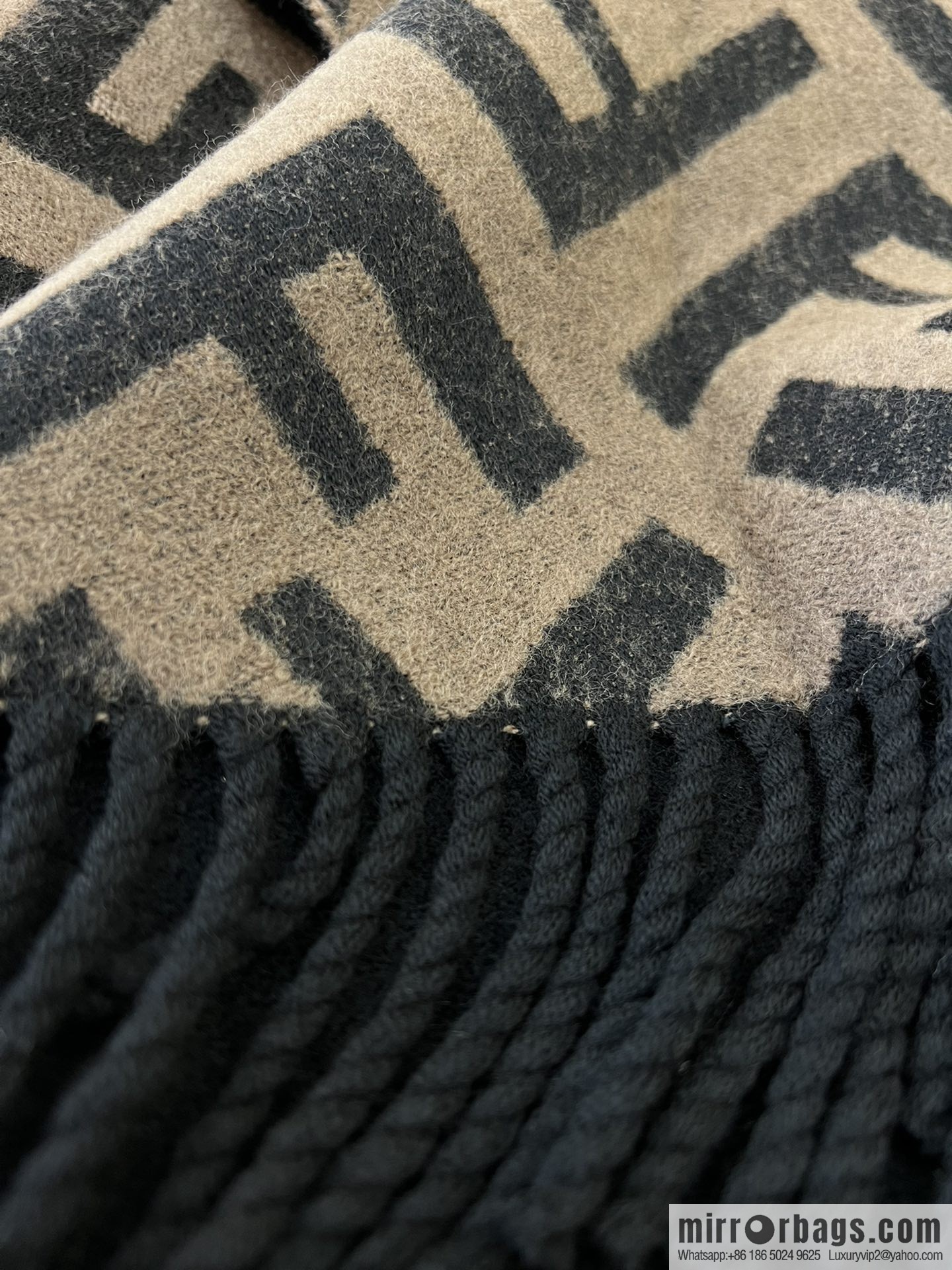 FENDI Fendi large FF pattern double-sided cape FXX715