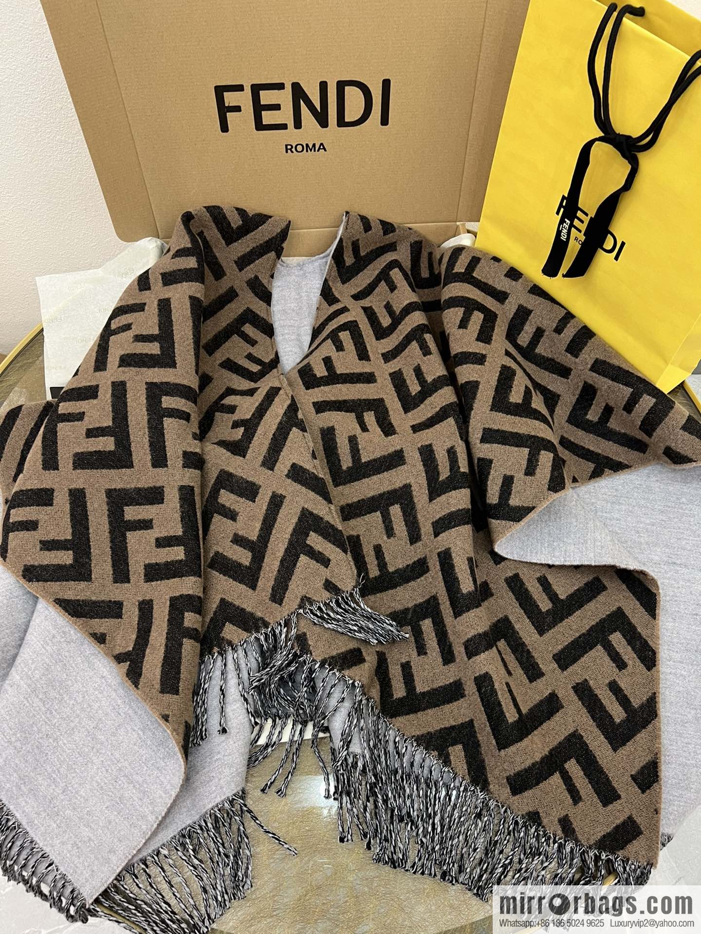 FENDI Fendi cashmere and wool blend double-sided cape FXX715