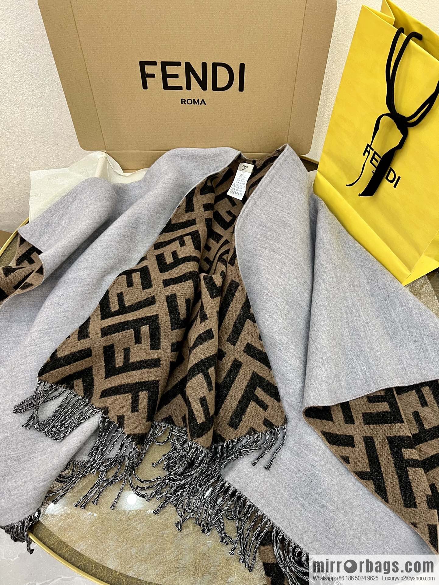 FENDI Fendi cashmere and wool blend double-sided cape FXX715