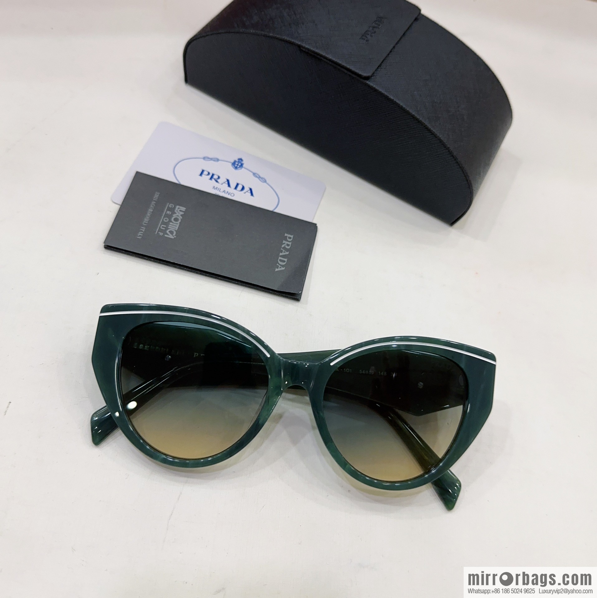 Prada round frame women's sunglasses