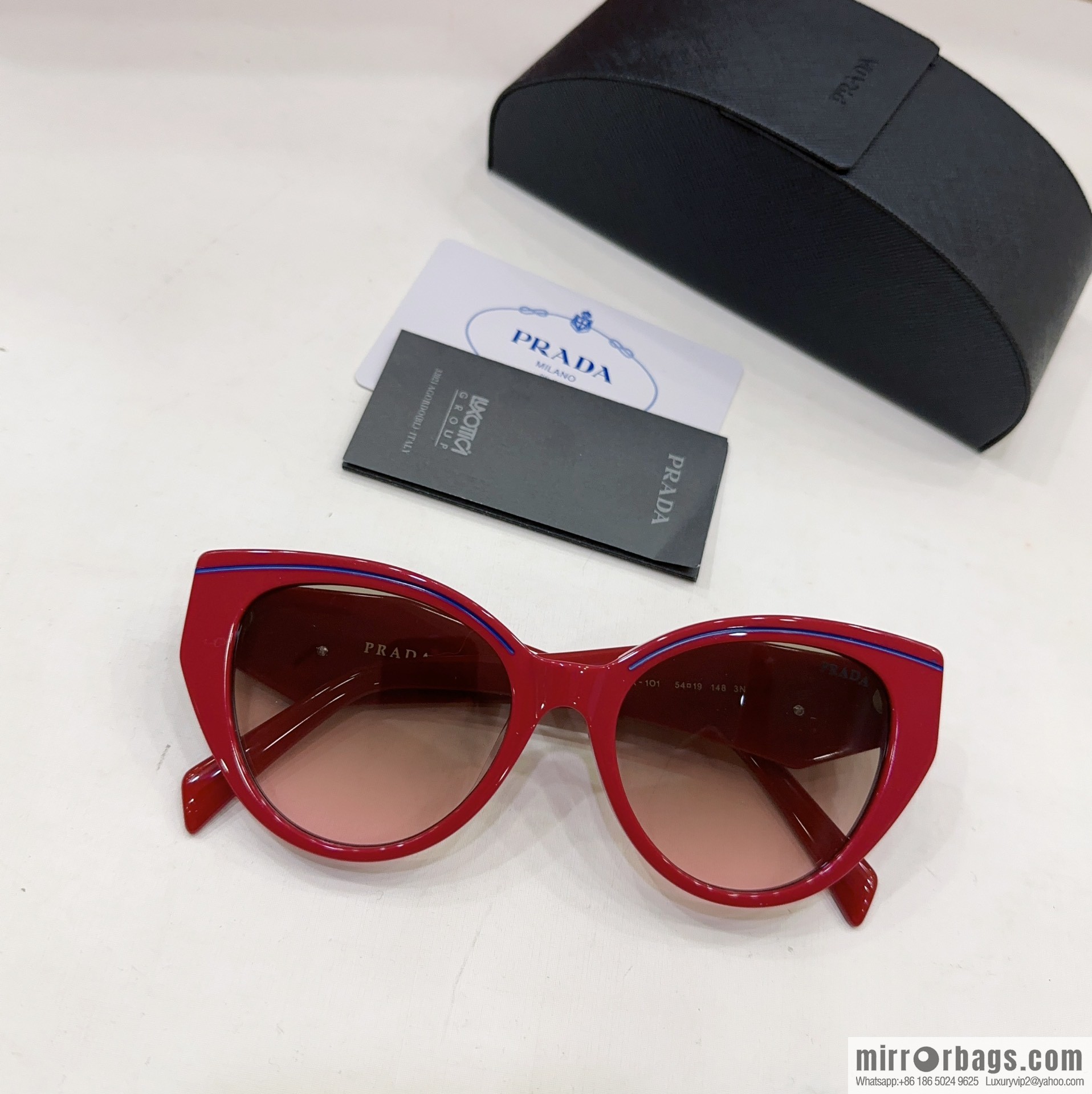 Prada round frame women's sunglasses