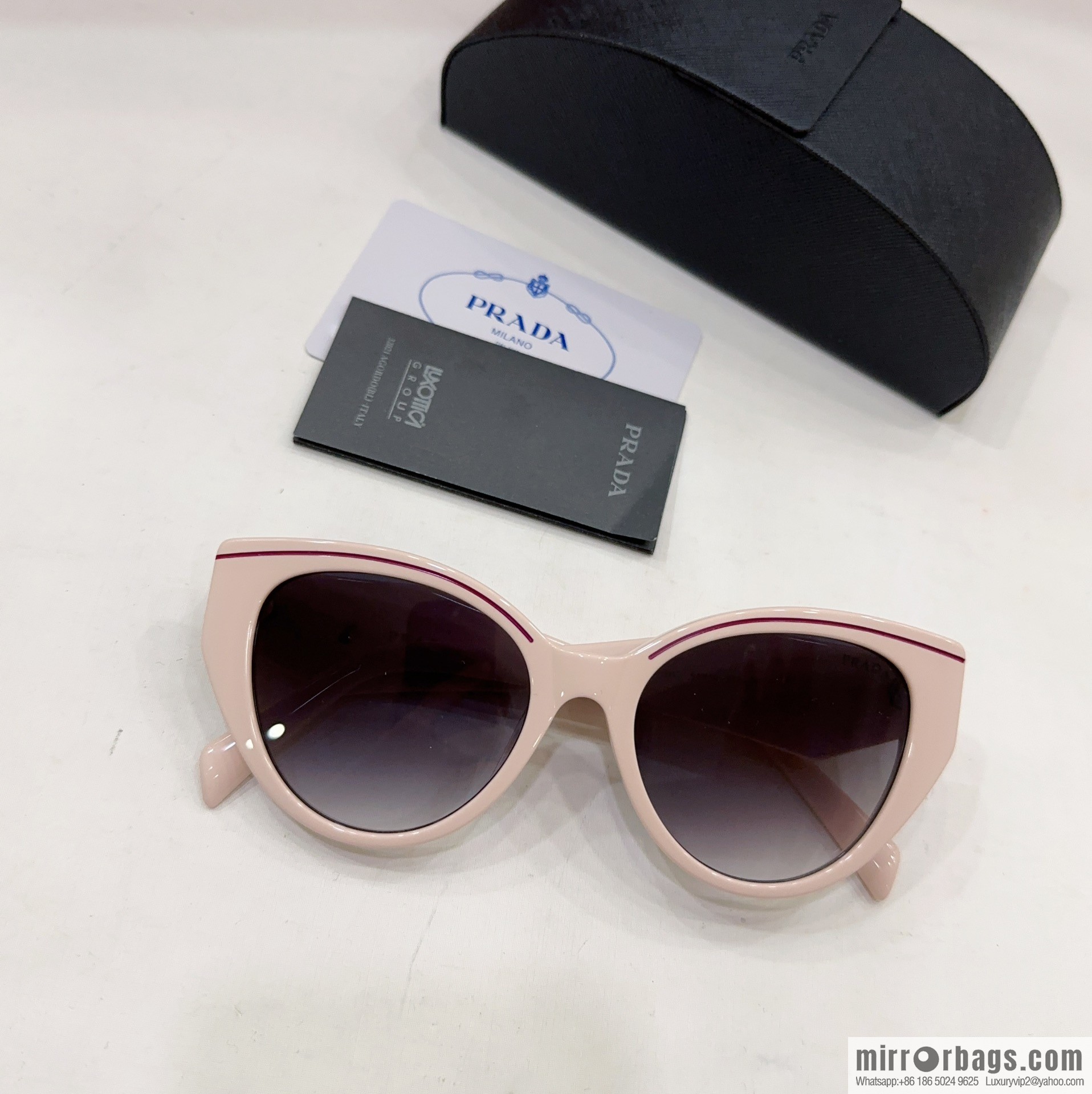 Prada round frame women's sunglasses