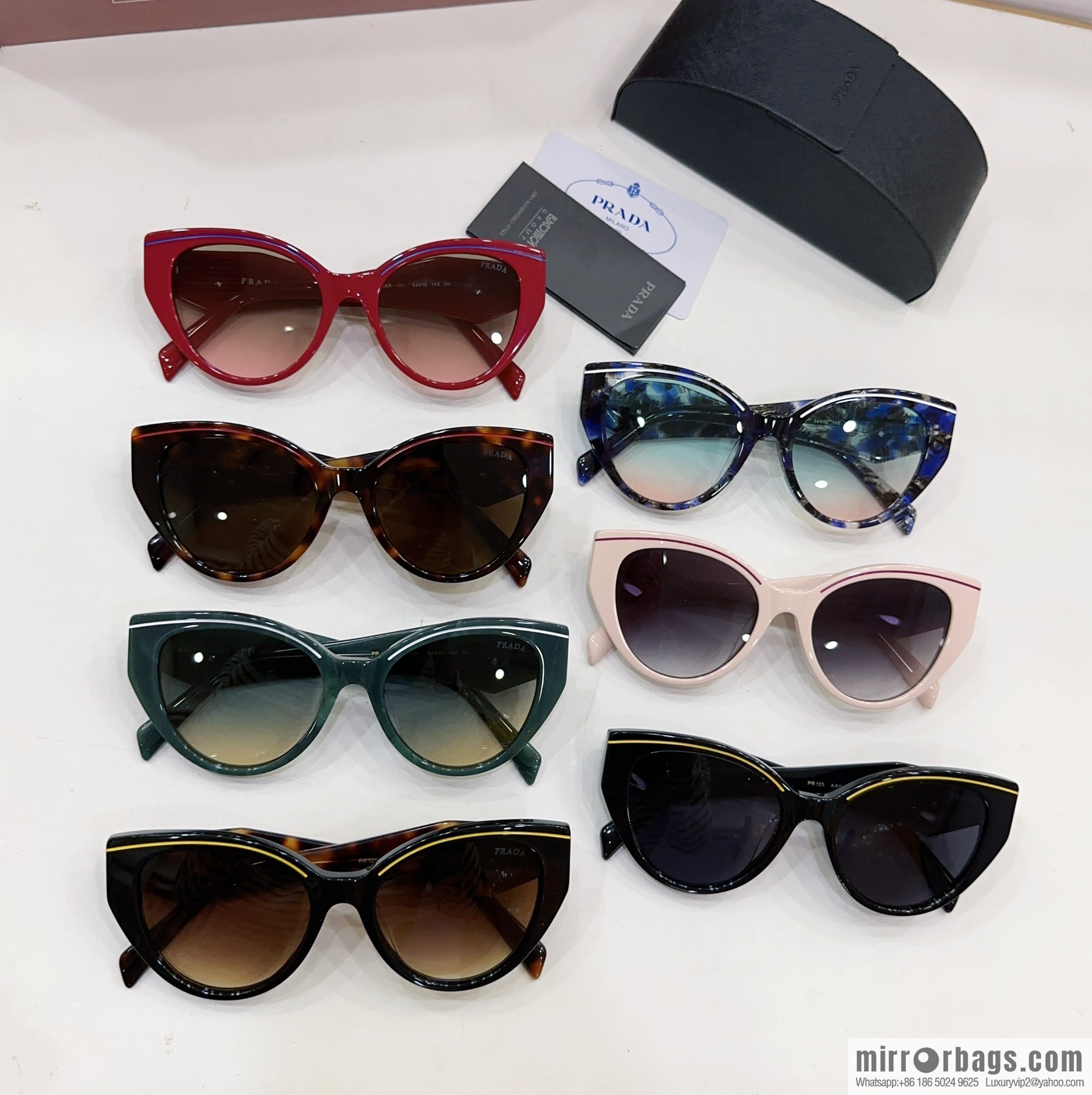 Prada round frame women's sunglasses