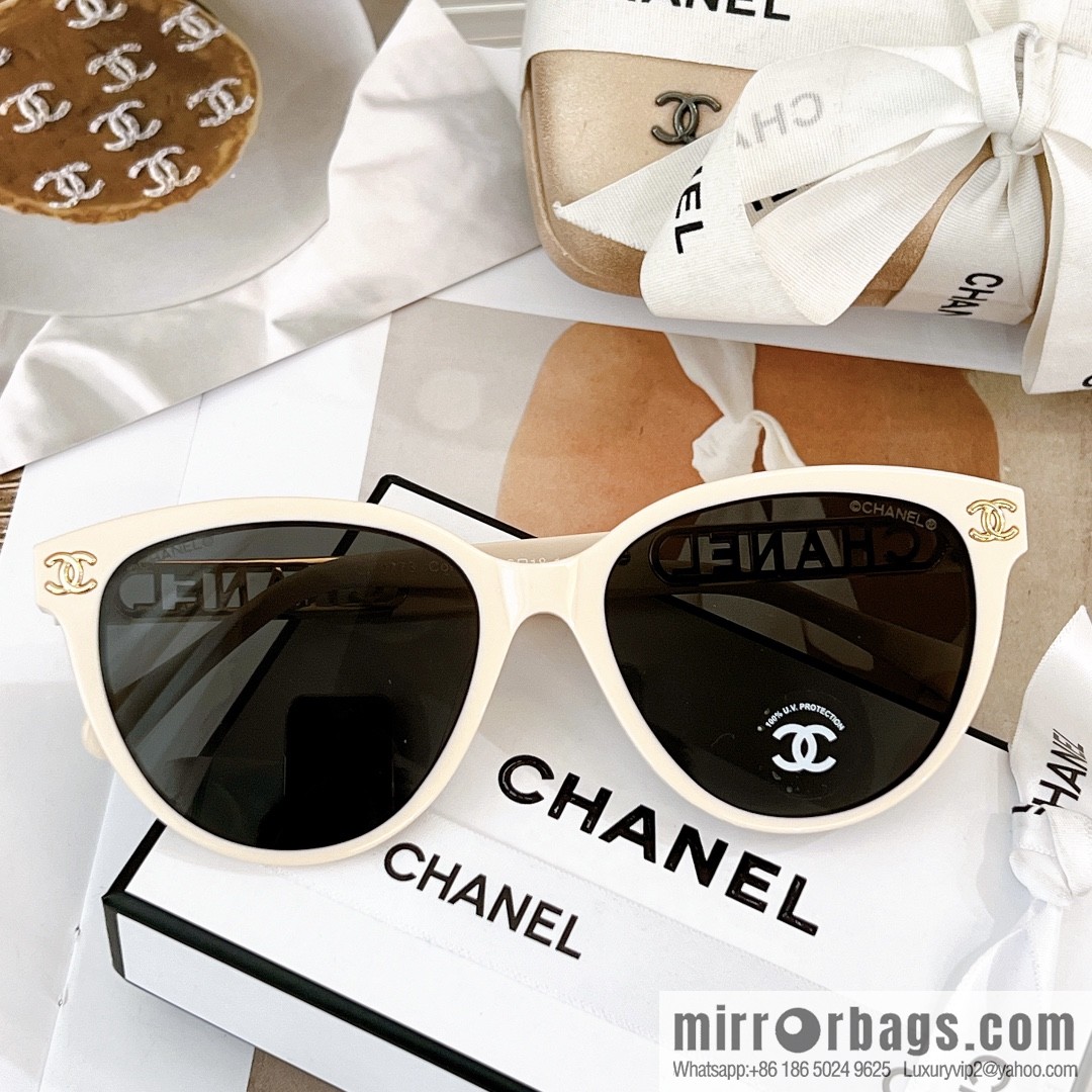 Chanel women's sunglasses with half circle drill letters