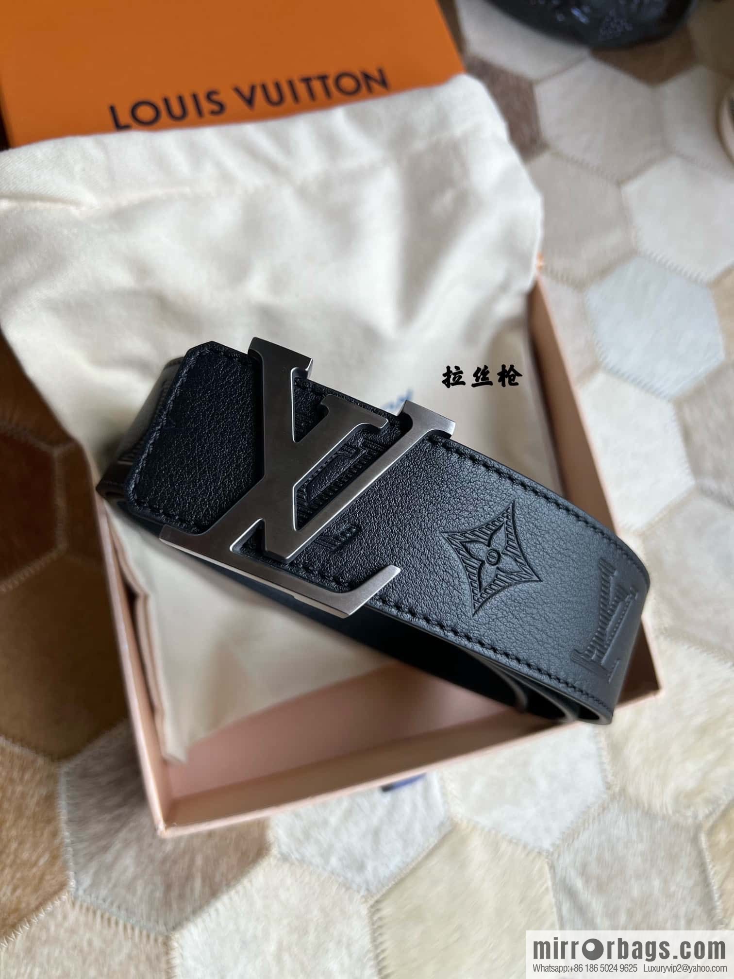 LV/Louis Vuitton, letter metal buckle cowhide embossed belt 40mm.