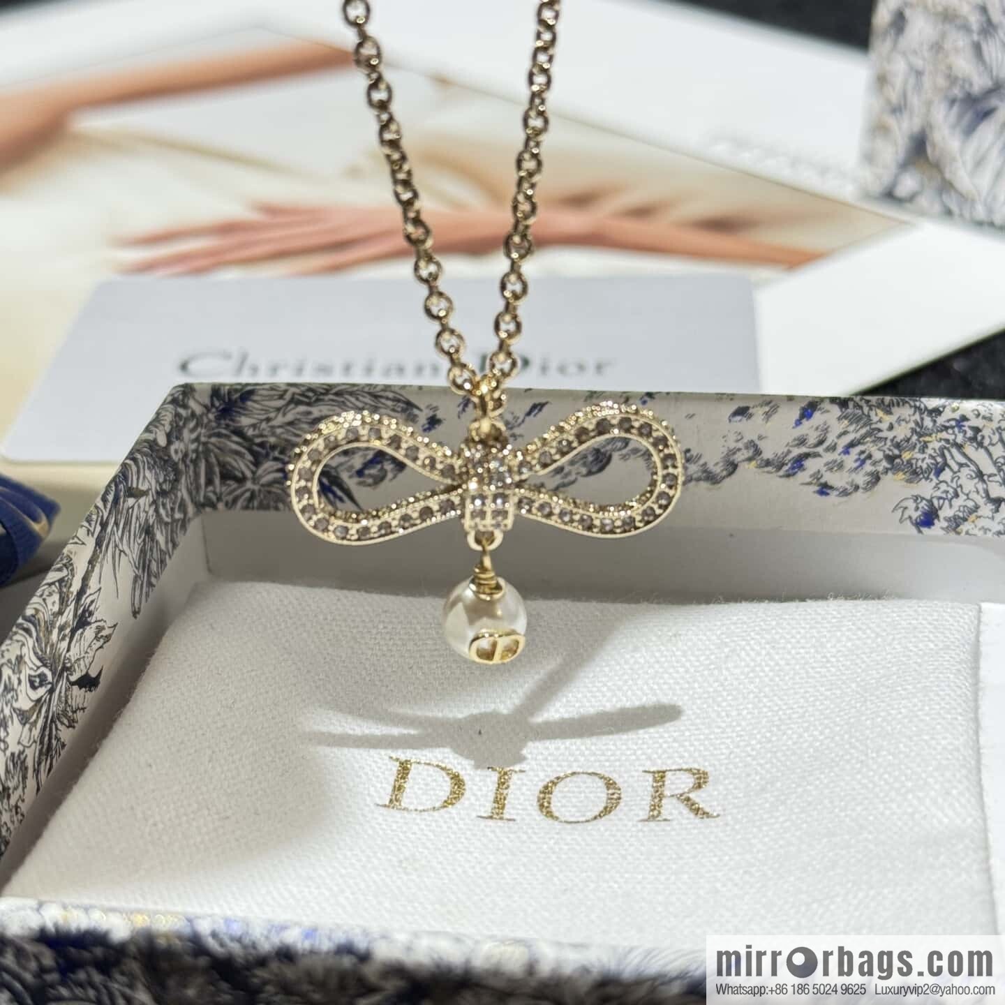 ☀️New ☑️ DIOR bow pearl necklace