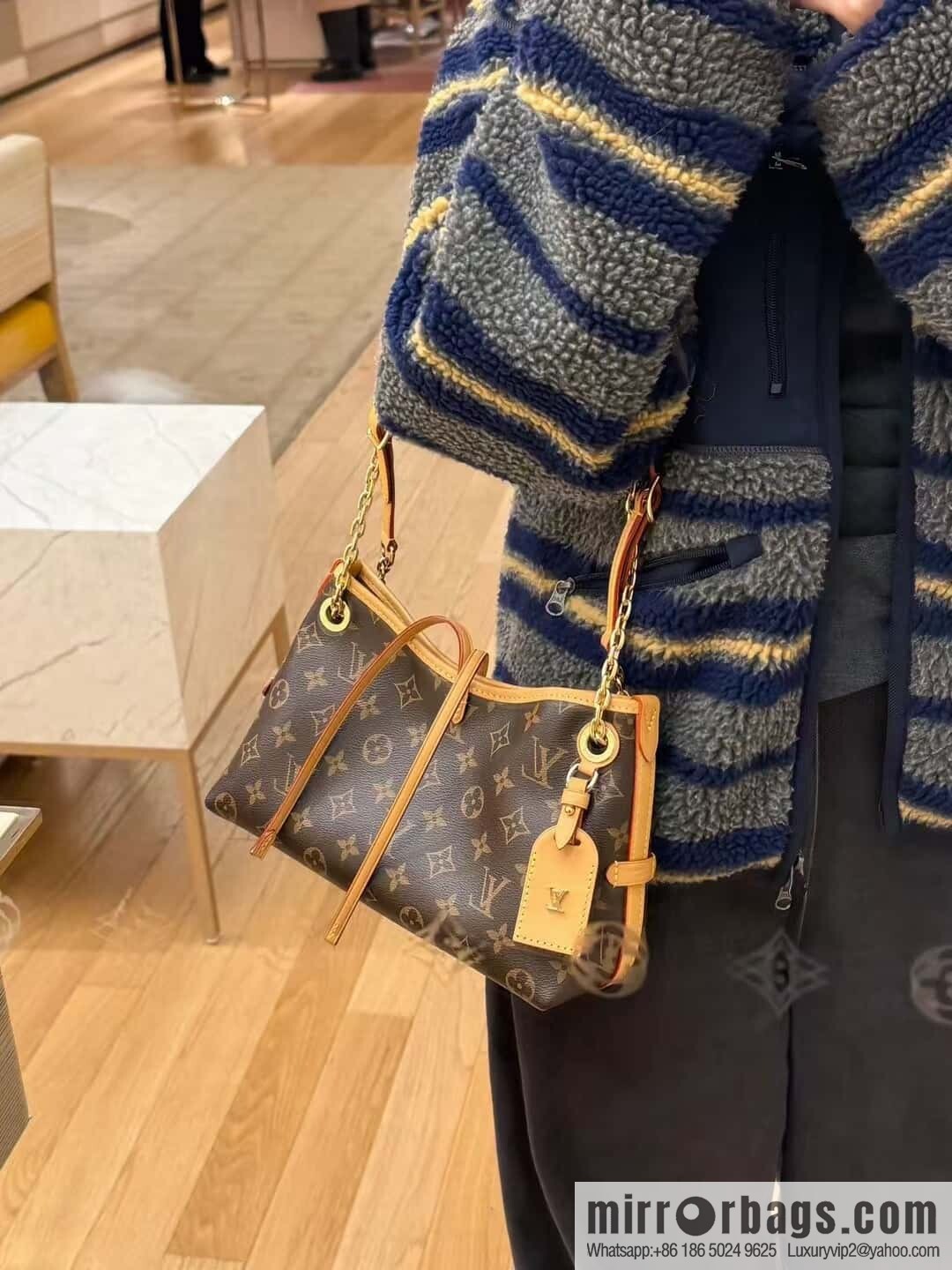 LV M13014 CarryAll BB