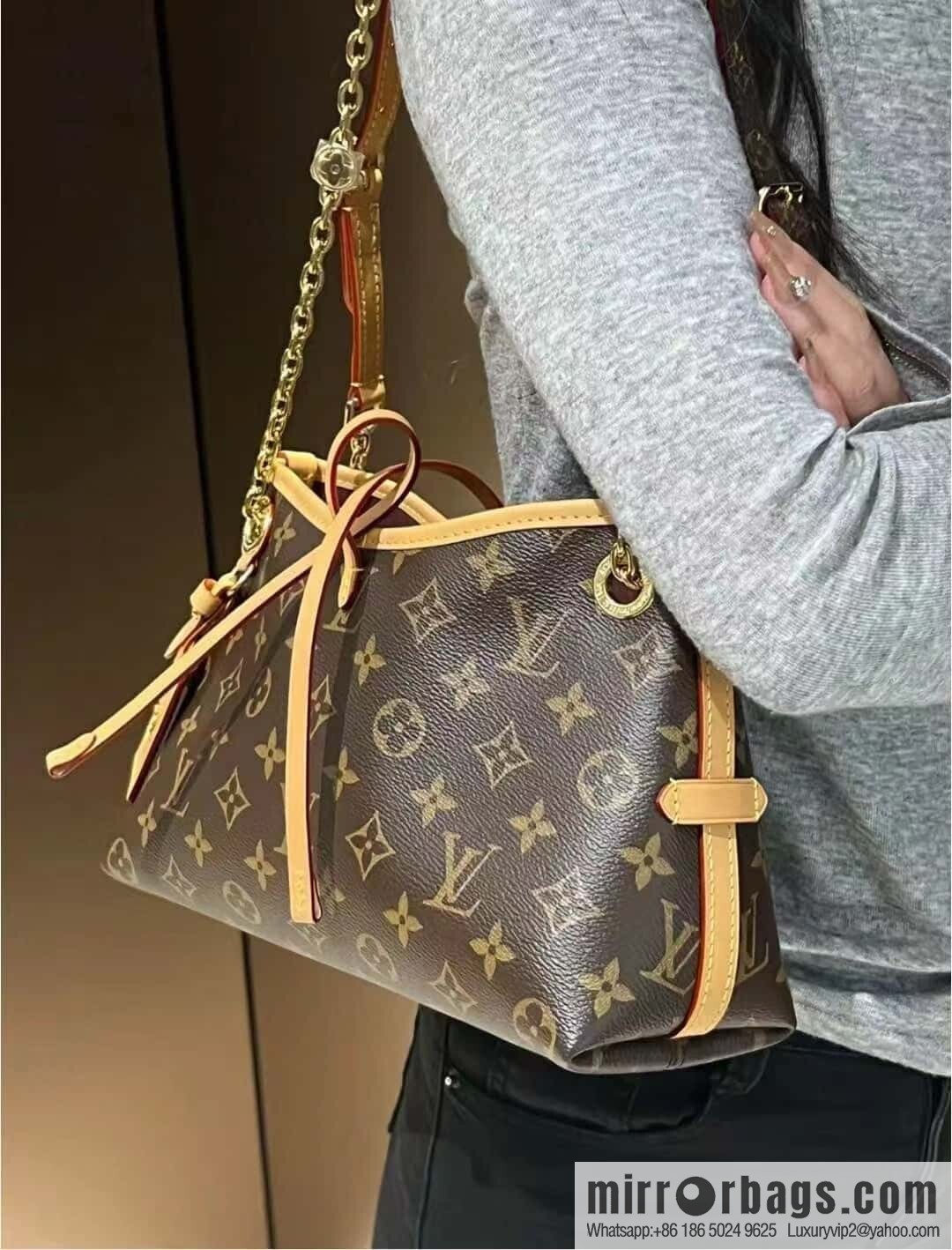 LV M13014 CarryAll BB