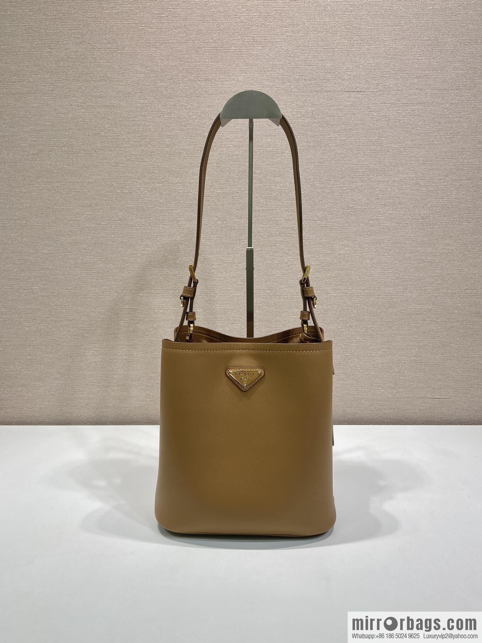 PRADA's new 1BE080 bucket bag, caramel color