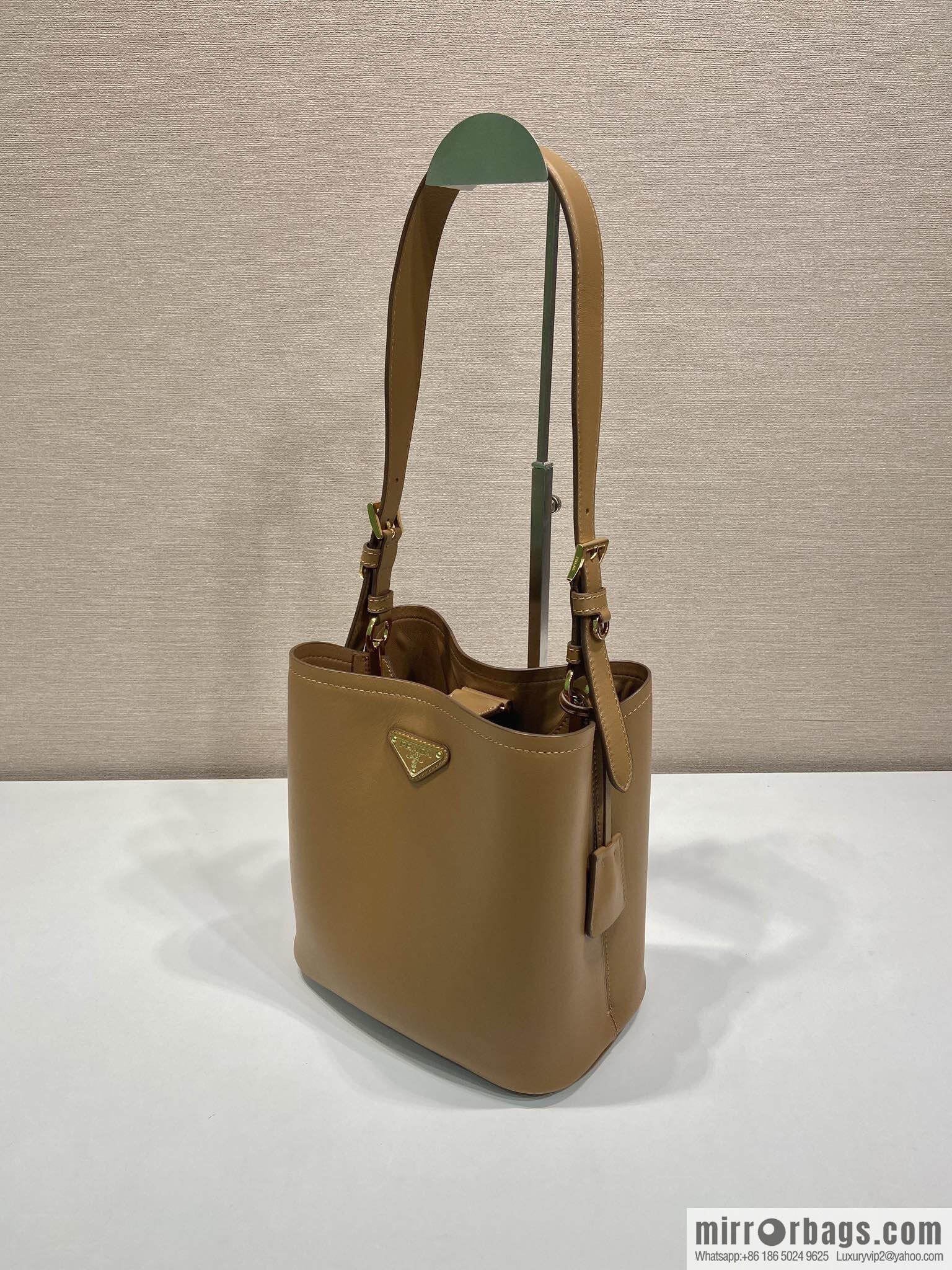 PRADA's new 1BE080 bucket bag, caramel color