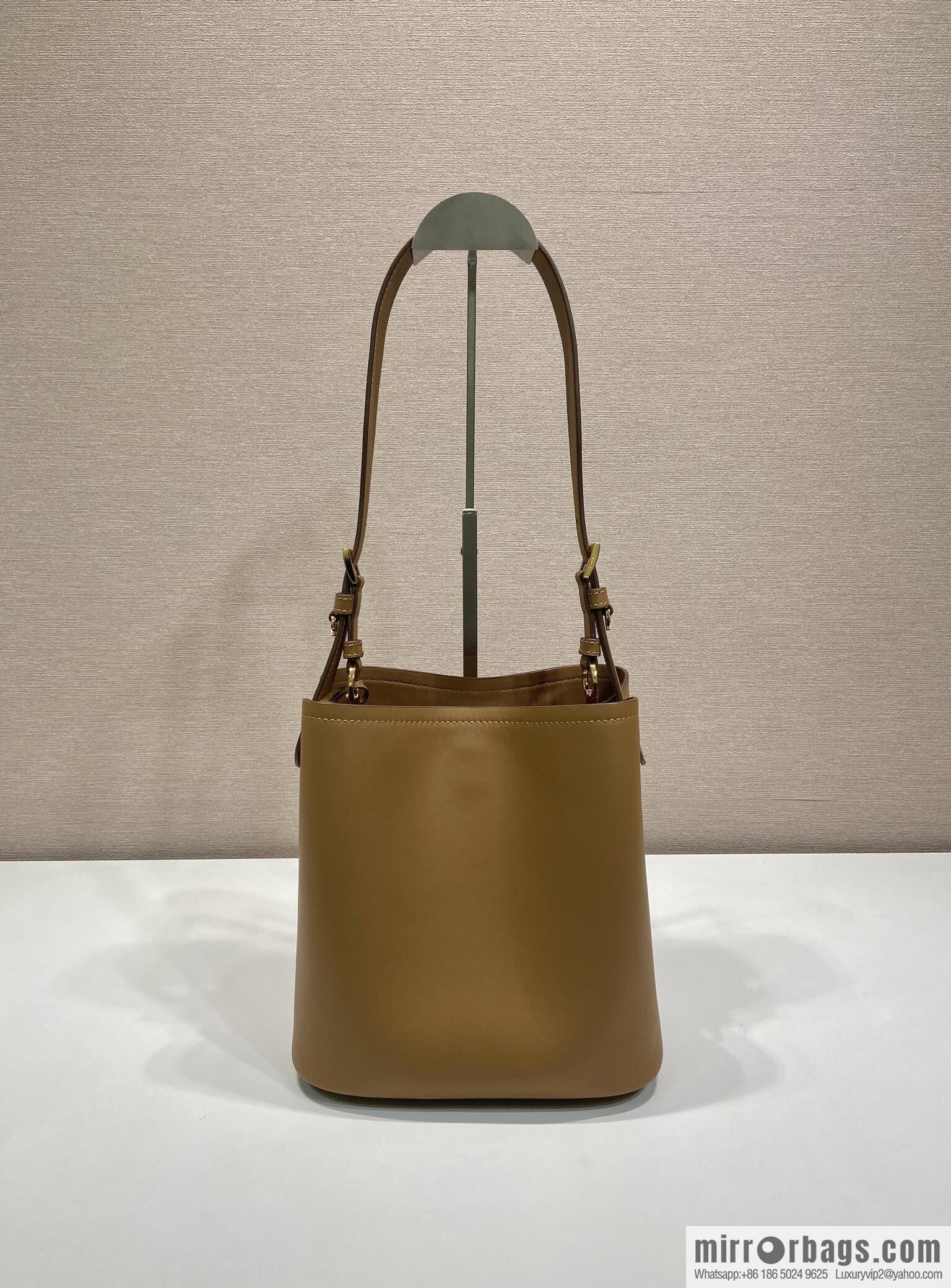 PRADA's new 1BE080 bucket bag, caramel color