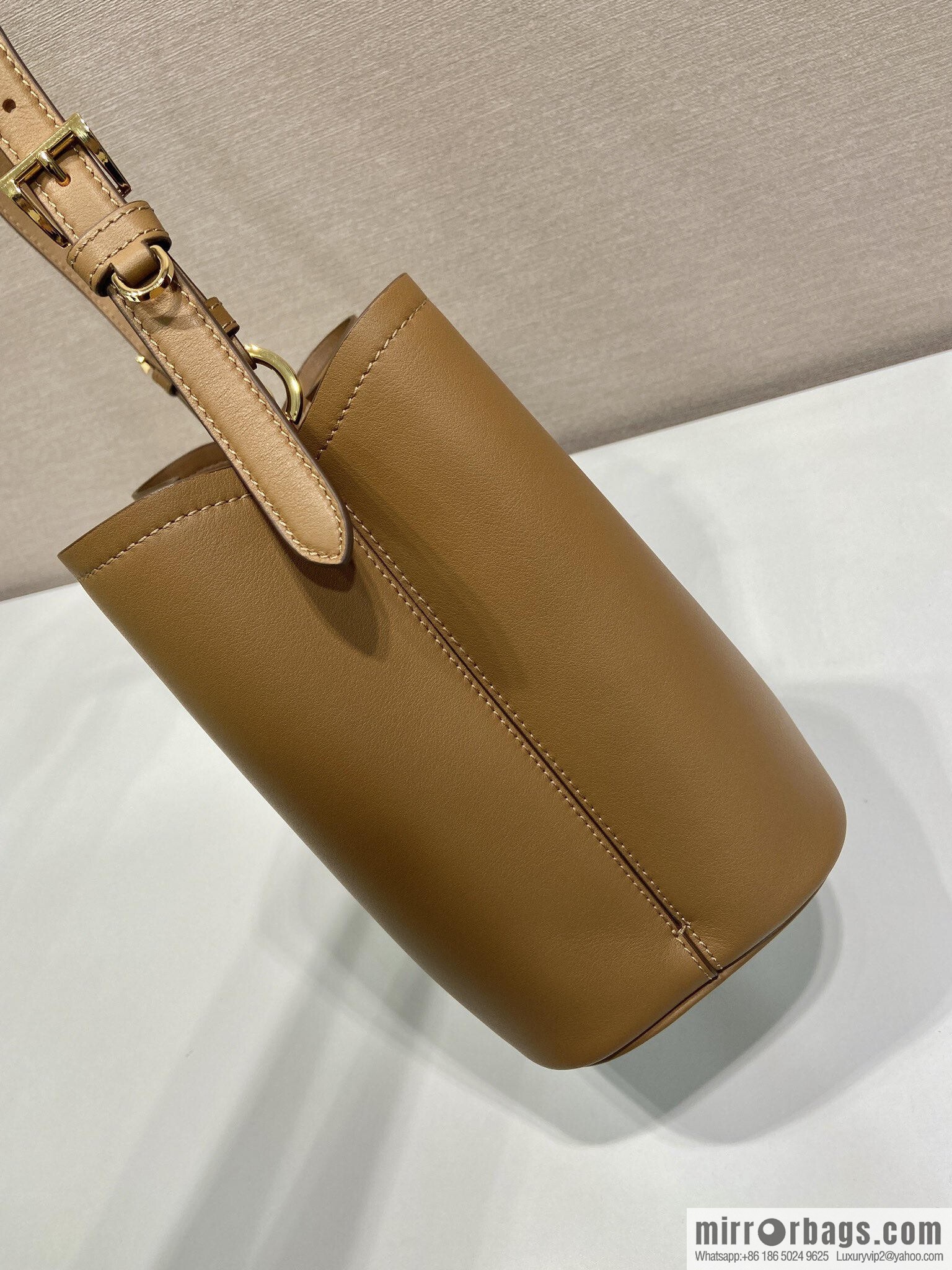 PRADA's new 1BE080 bucket bag, caramel color
