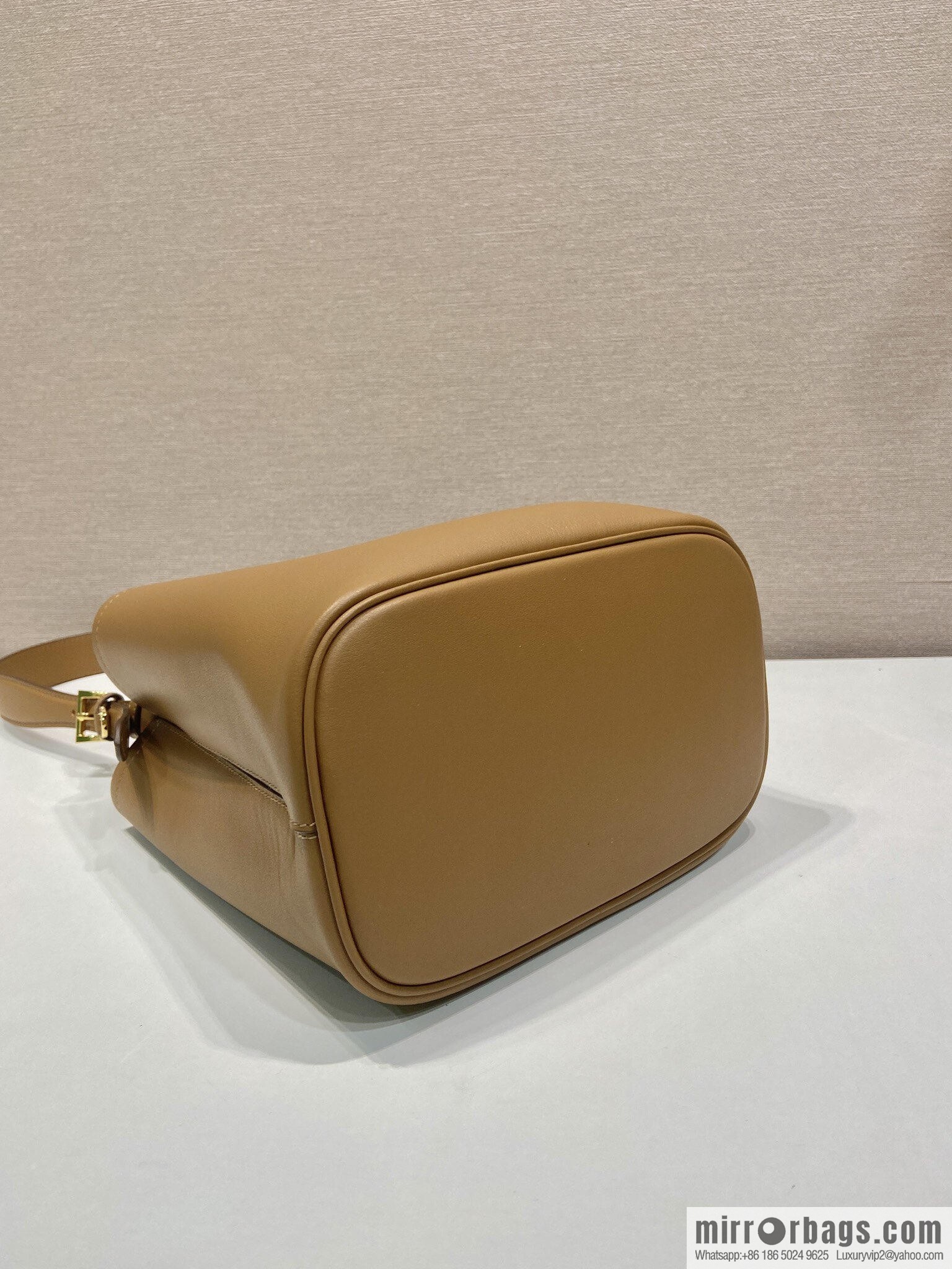 PRADA's new 1BE080 bucket bag, caramel color