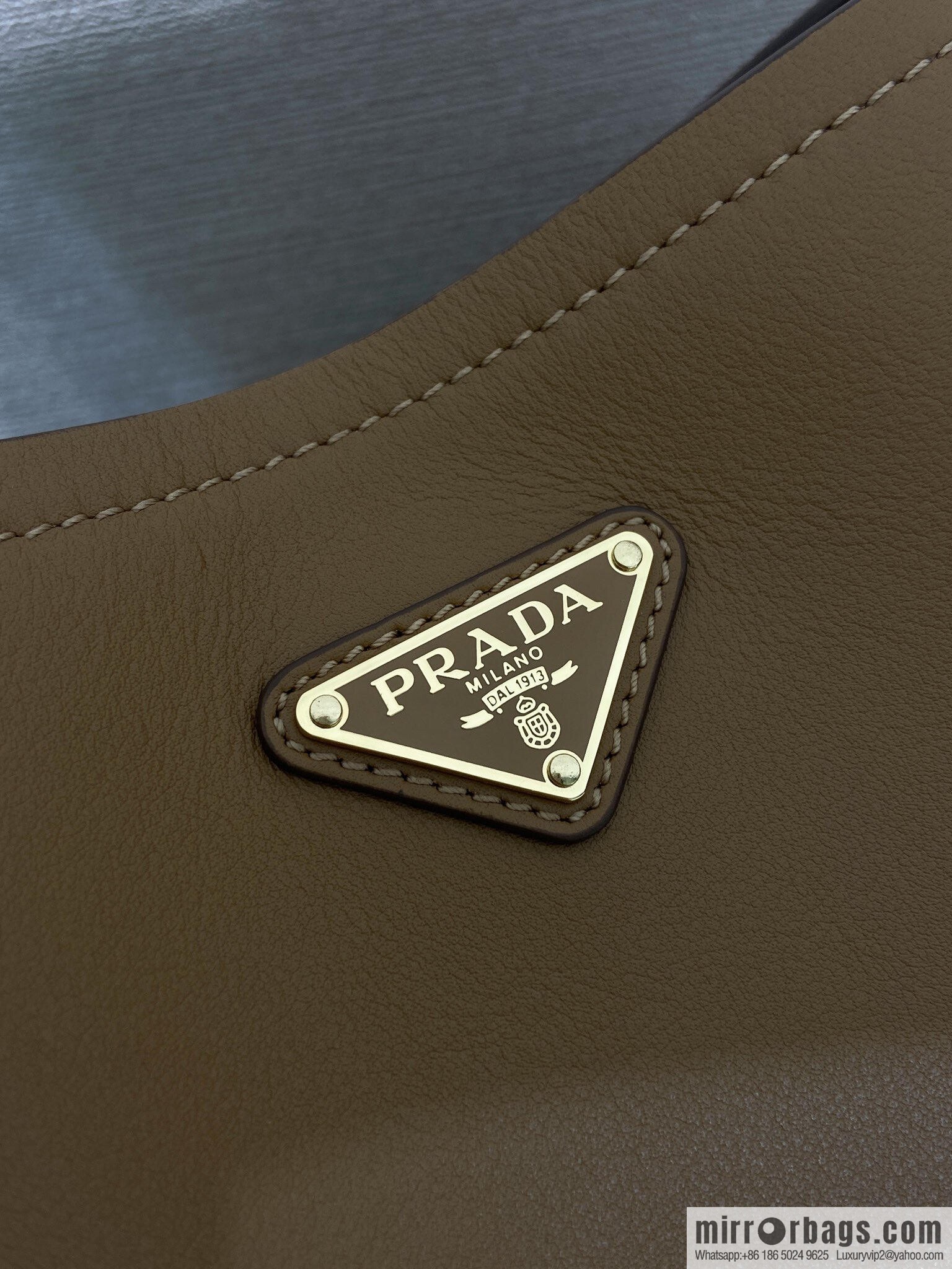 PRADA's new 1BE080 bucket bag, caramel color