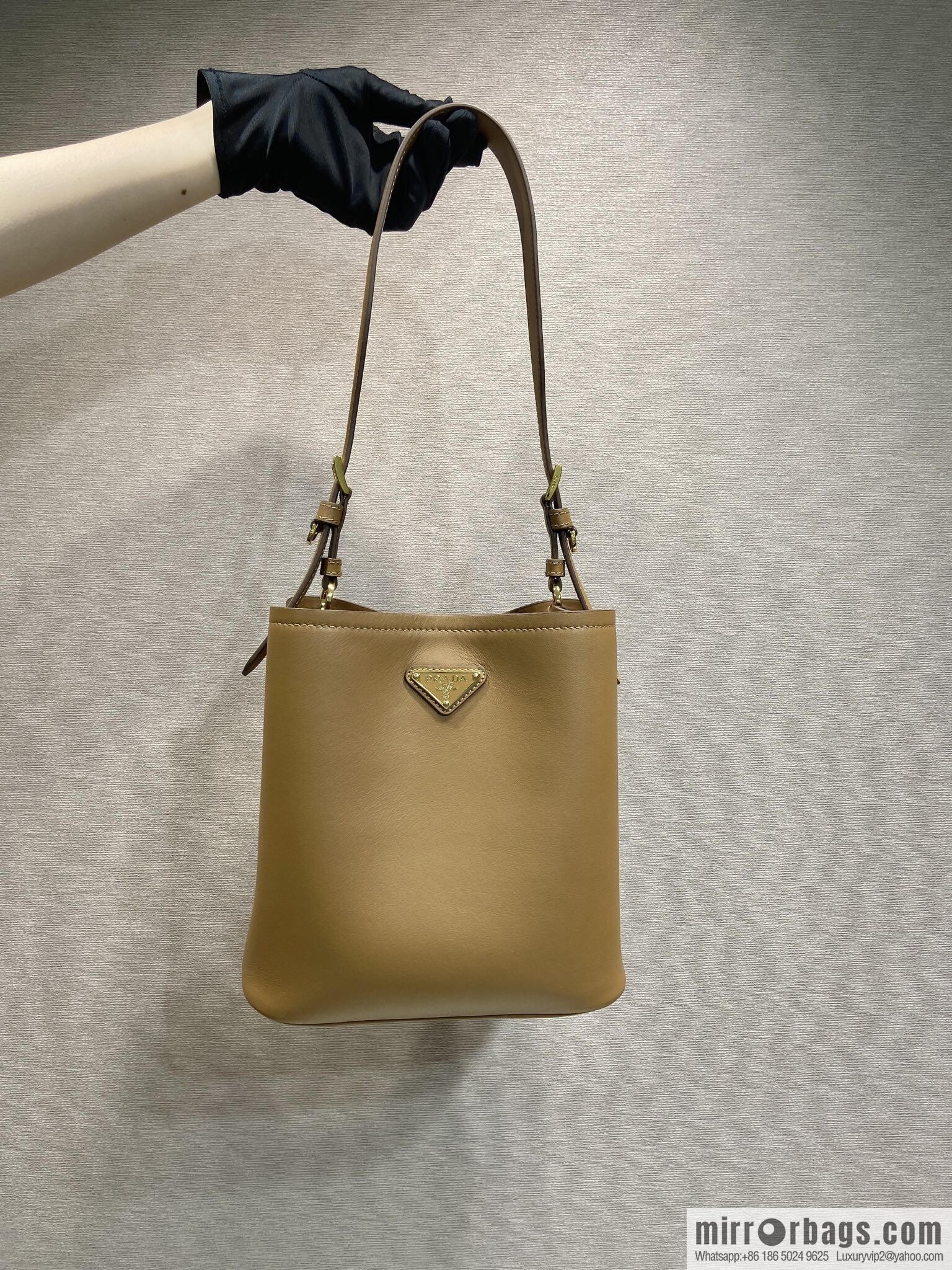 PRADA's new 1BE080 bucket bag, caramel color