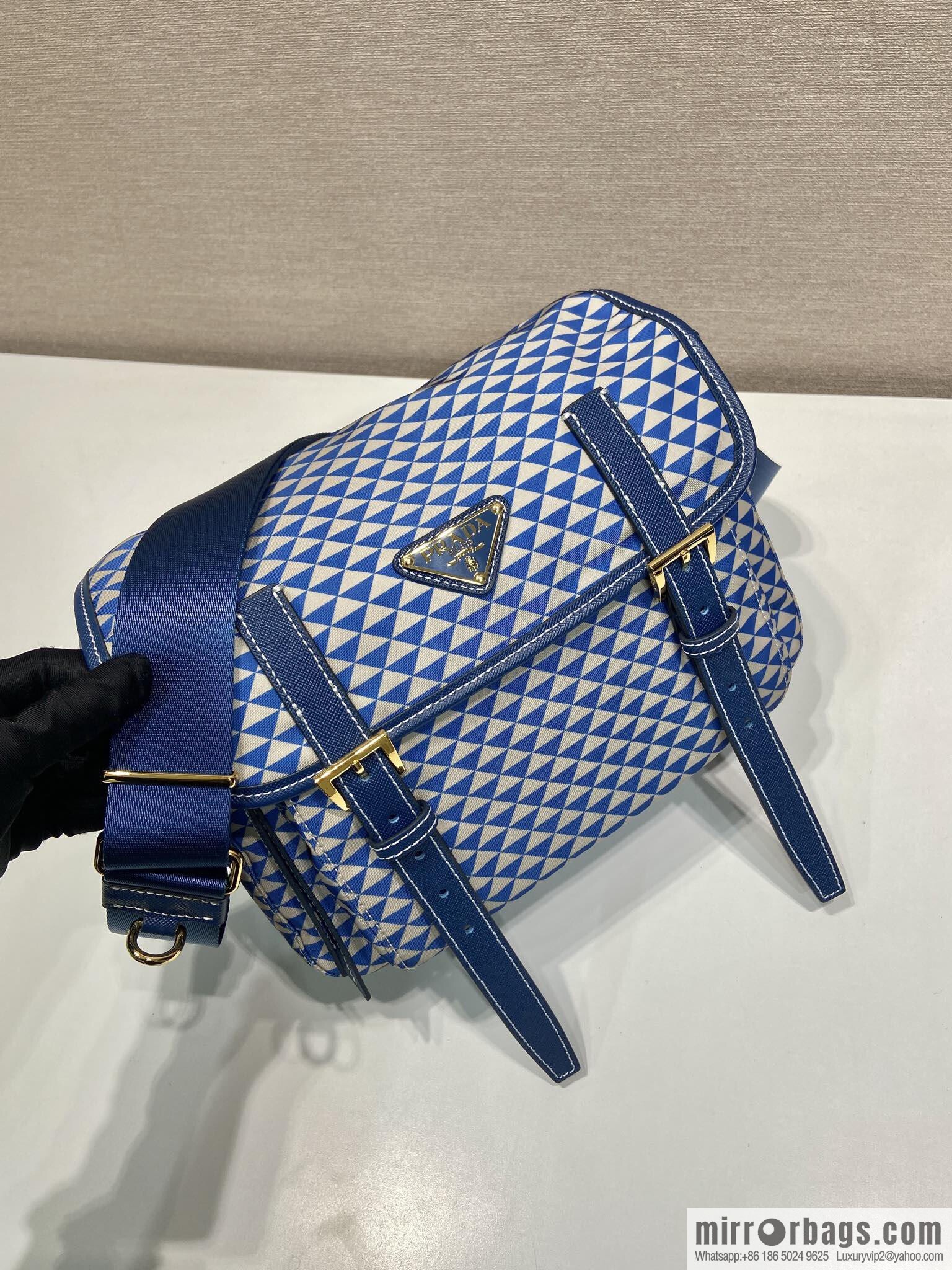 PRADA's new Symbole1BD383 messenger bag, blue