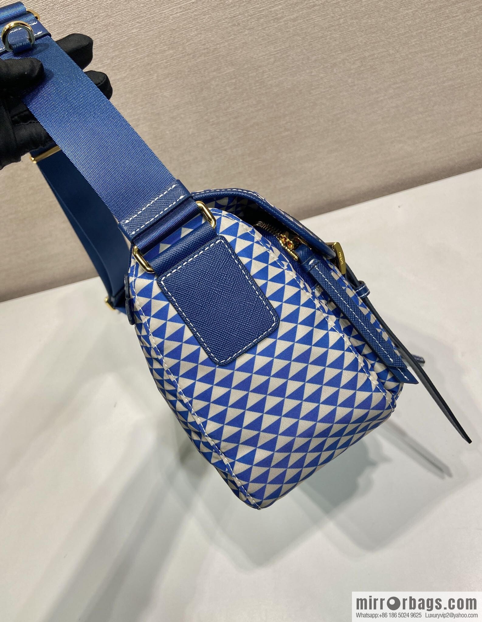 PRADA's new Symbole1BD383 messenger bag, blue