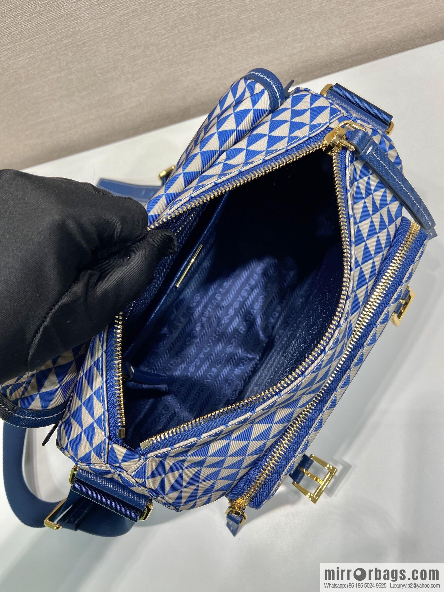PRADA's new Symbole1BD383 messenger bag, blue